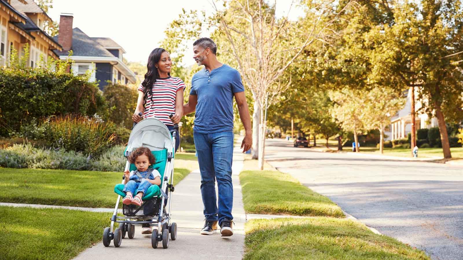 Stock image of a family taking a stroll