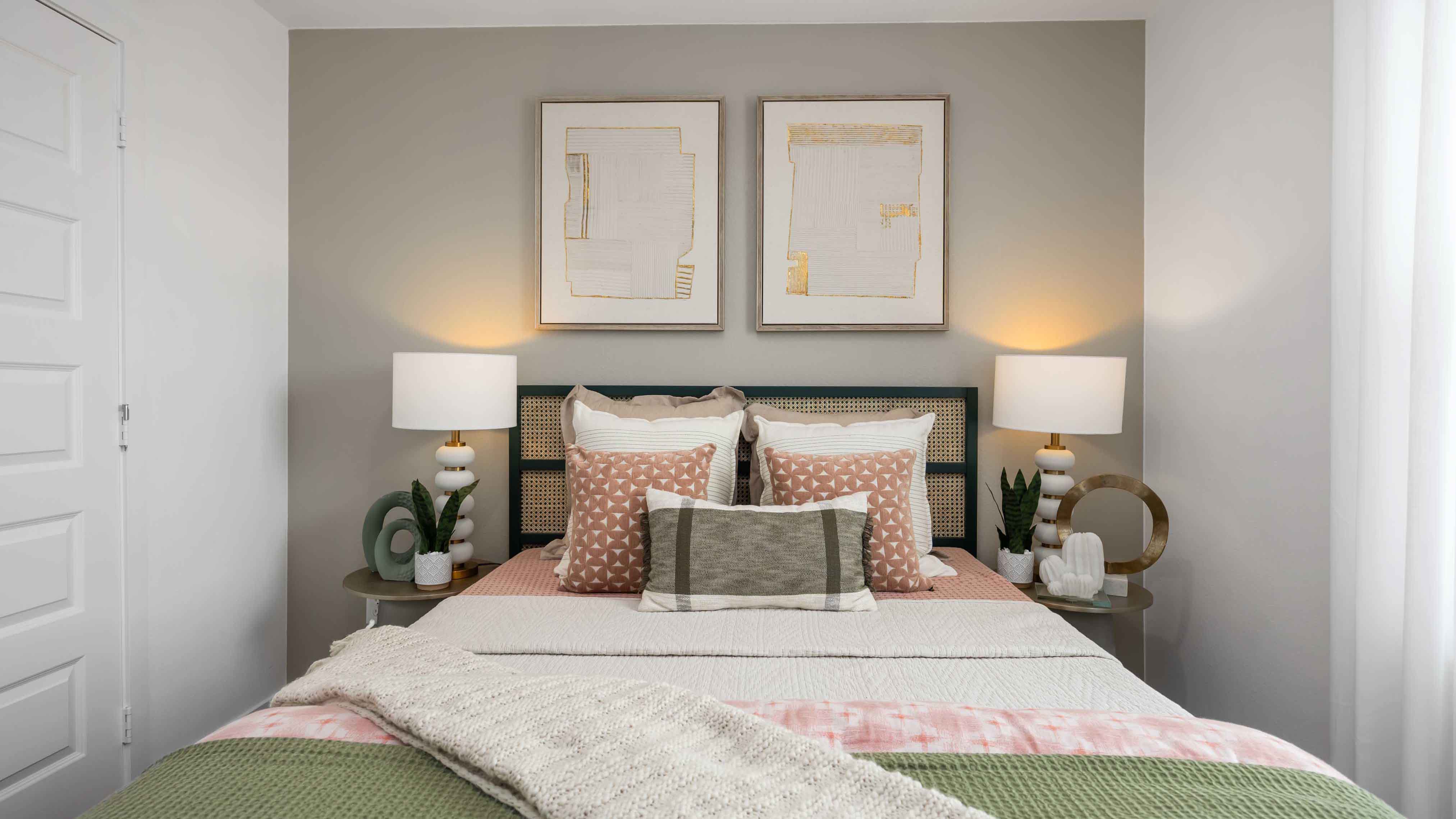 secondary bedrooms have light neutral walls and carpet flooring