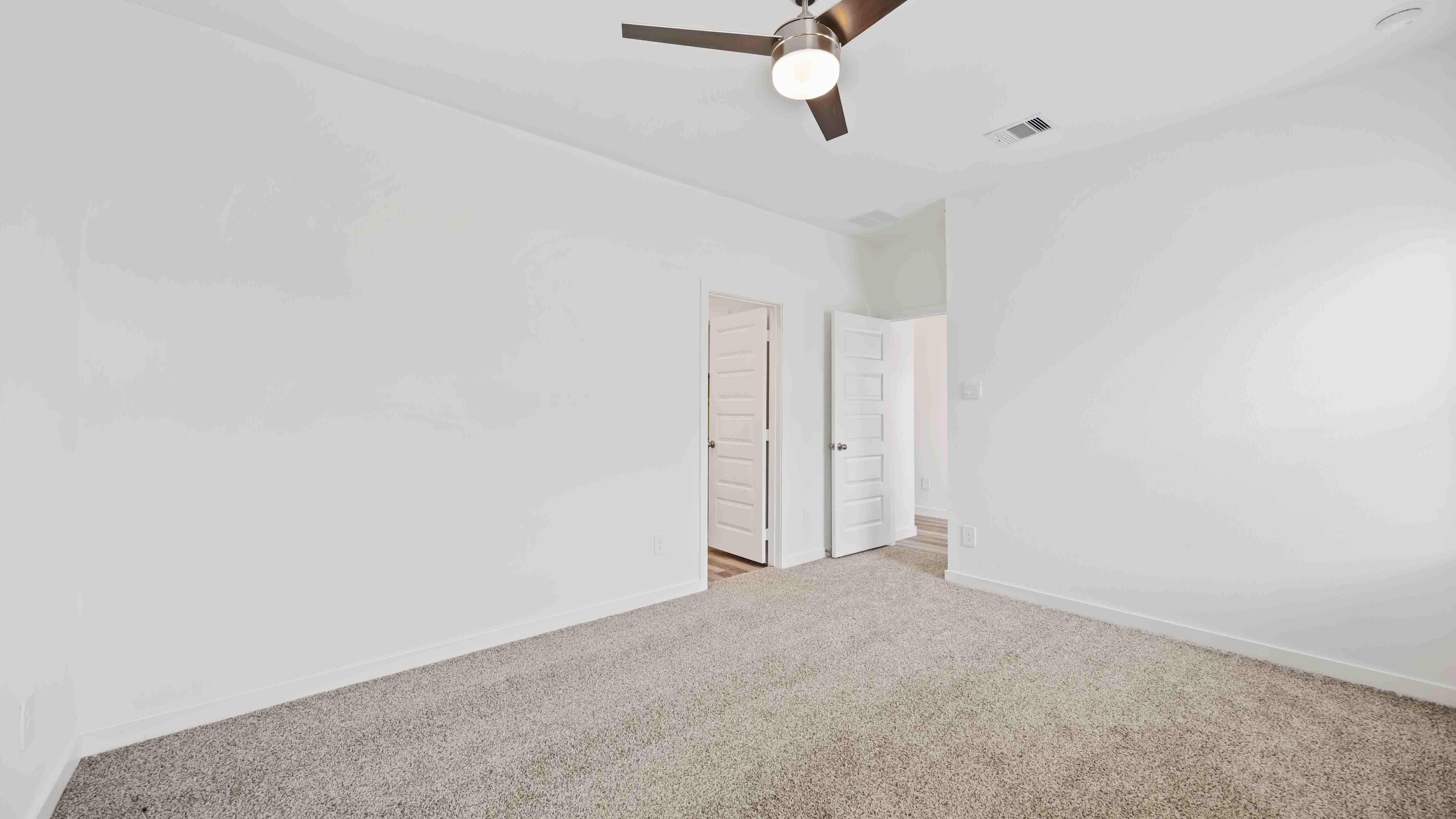 a second bedroom upstairs has a window for natural light