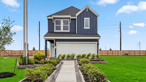 grand west model home, a two story single family home with a two car garage