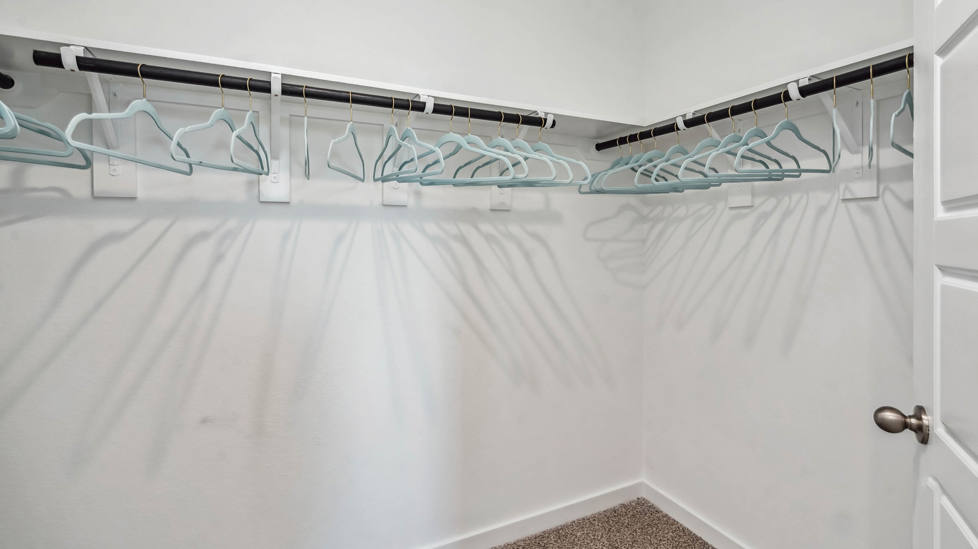 a spacious closet is located just off the primary bathroom