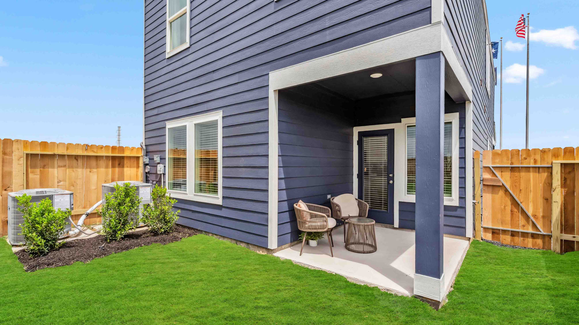 a covered patio is perfect for dining or lounging outdoors