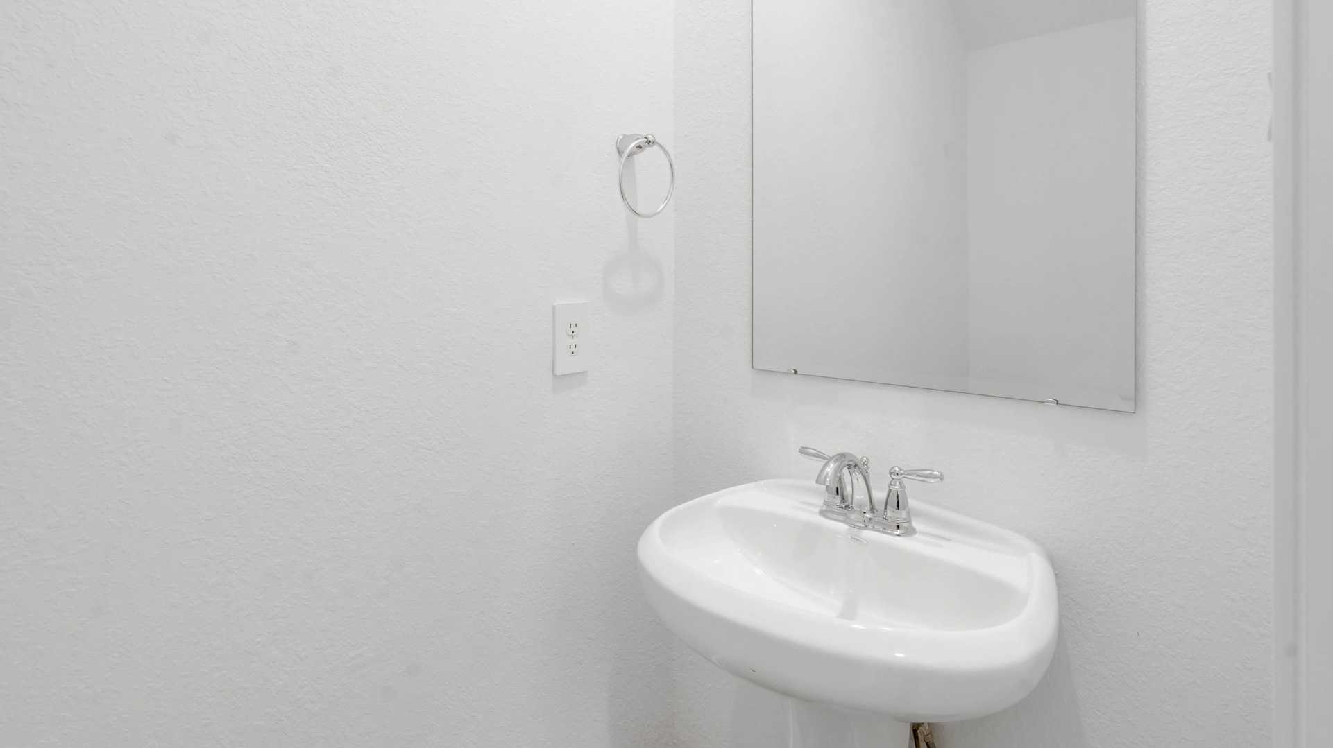 half bathroom located on the first floor of the home