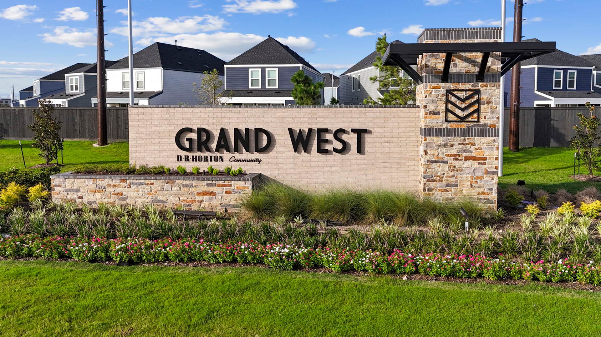 community entrance monument in Grand West, a new home community by D.R. Horton Houston