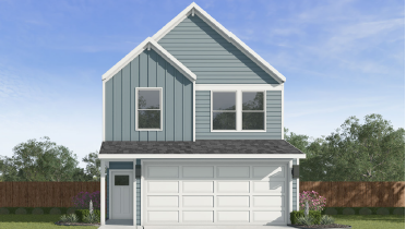 two-story home with siding and a two-car garage