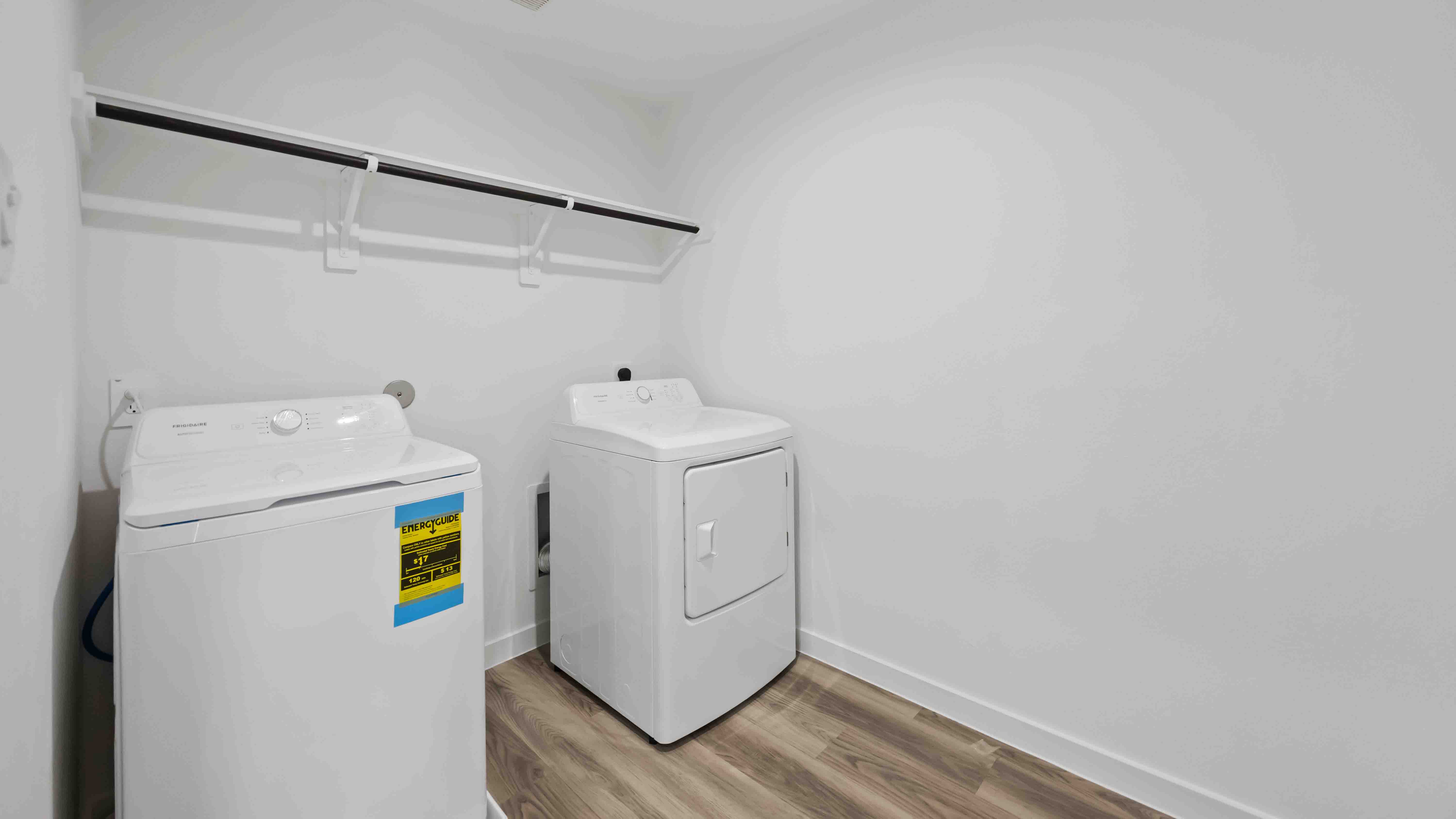 laundry room with storage