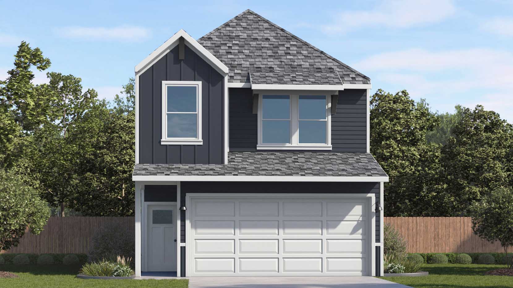 two-story home with siding and a two-car garage