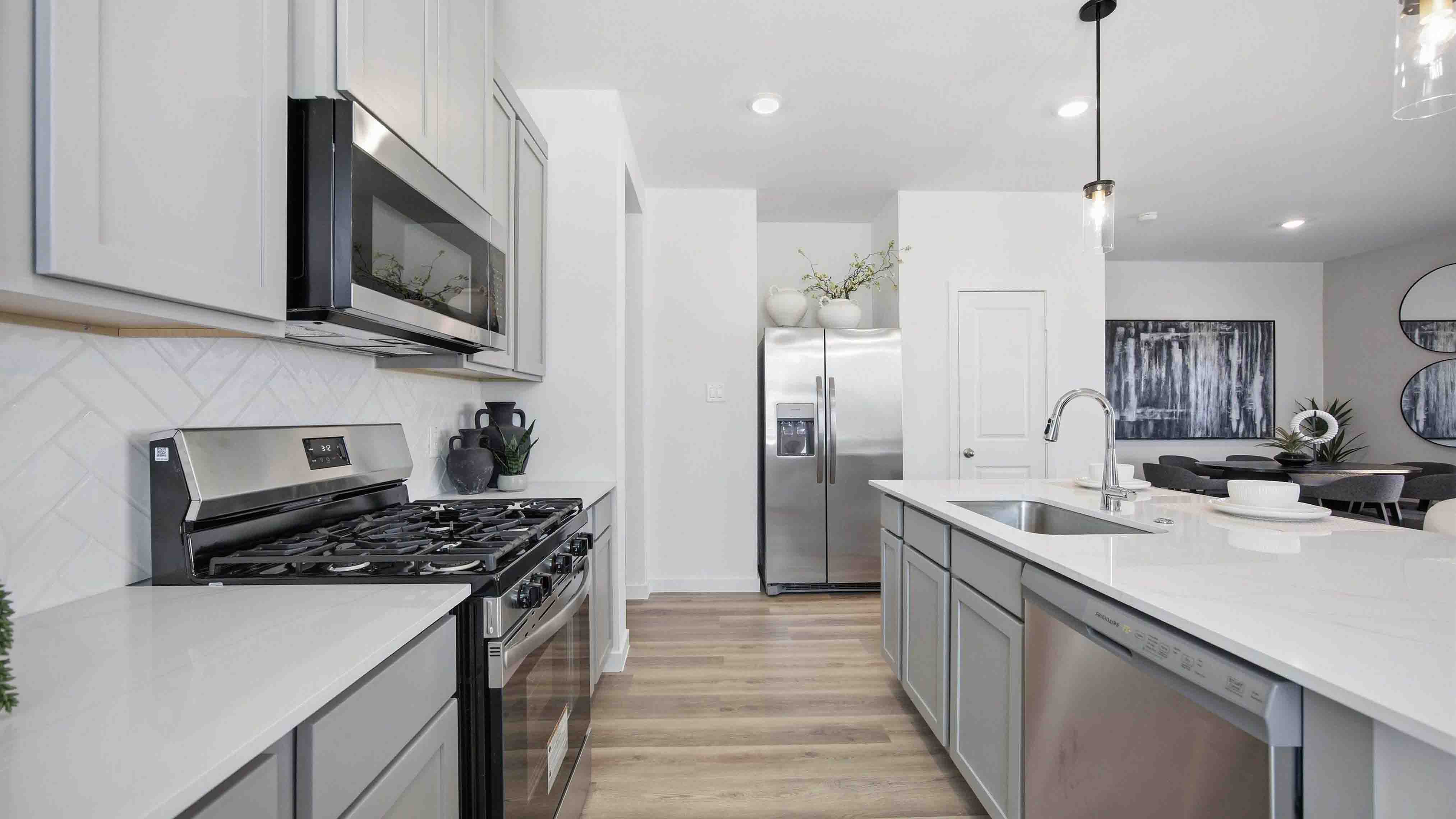 kitchen island - a spacious island offers bar seating perfect for dining or entertaining