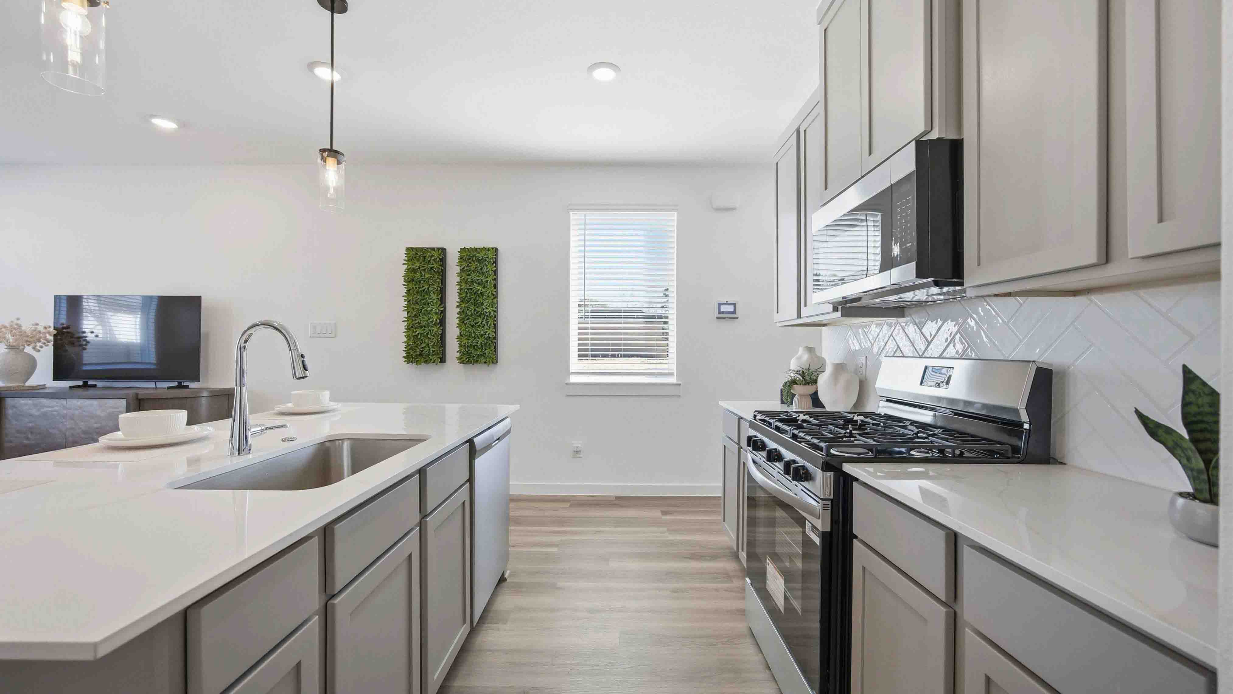 kitchen island - a spacious island offers bar seating perfect for dining or entertaining