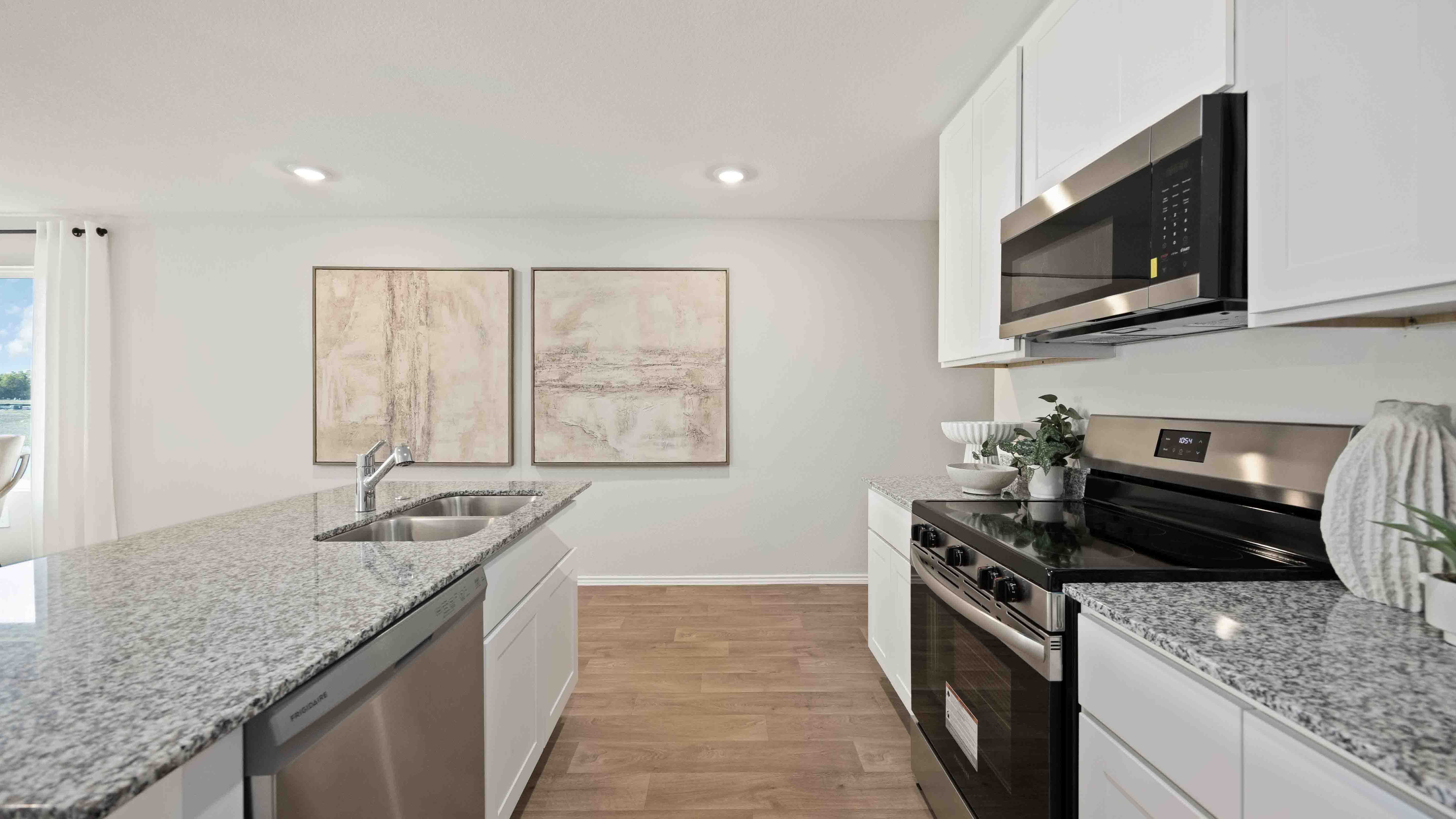 kitchen island - a spacious island offers bar seating perfect for dining or entertaining