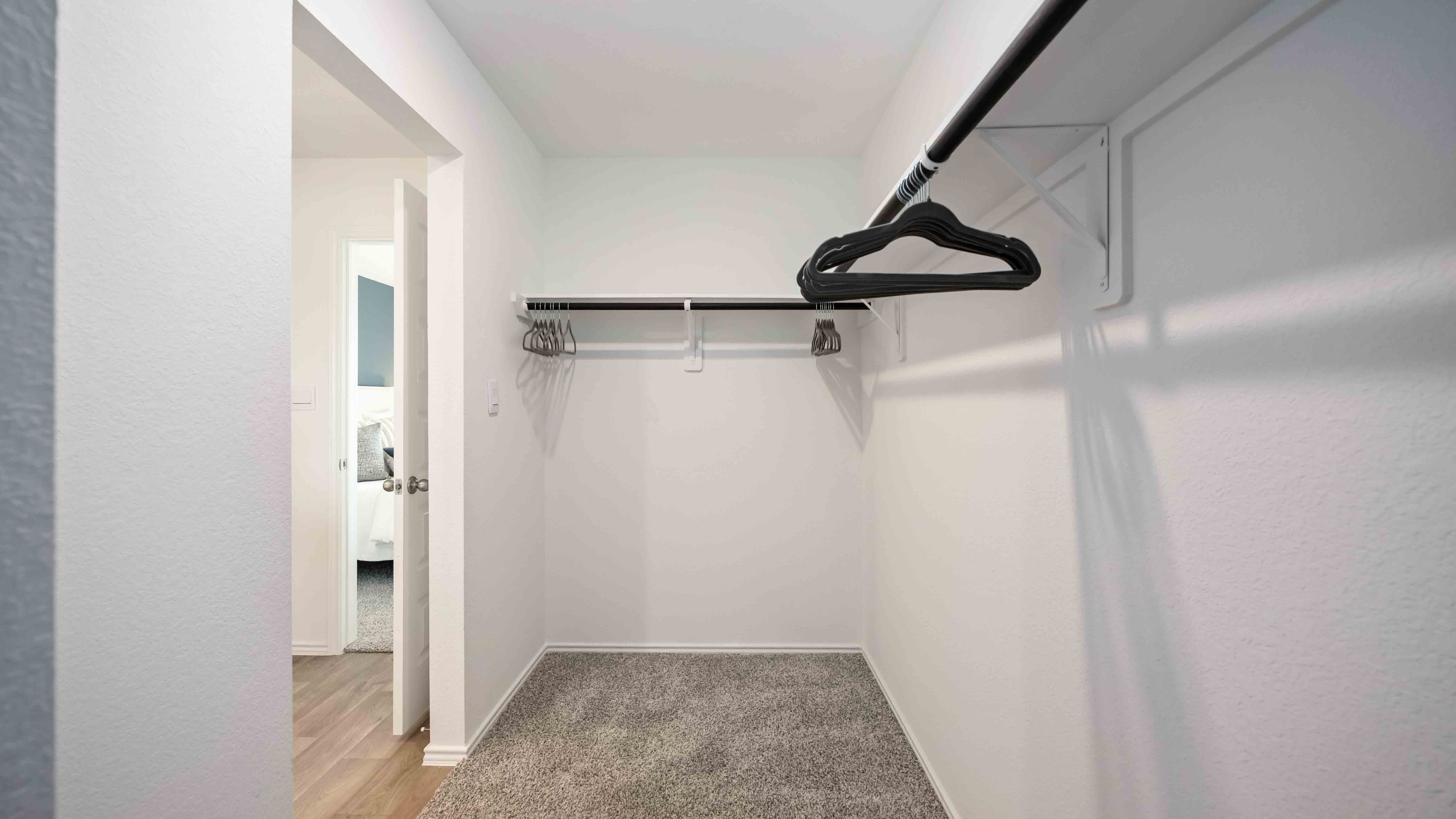 walk-in closet in the primary with lots of storage