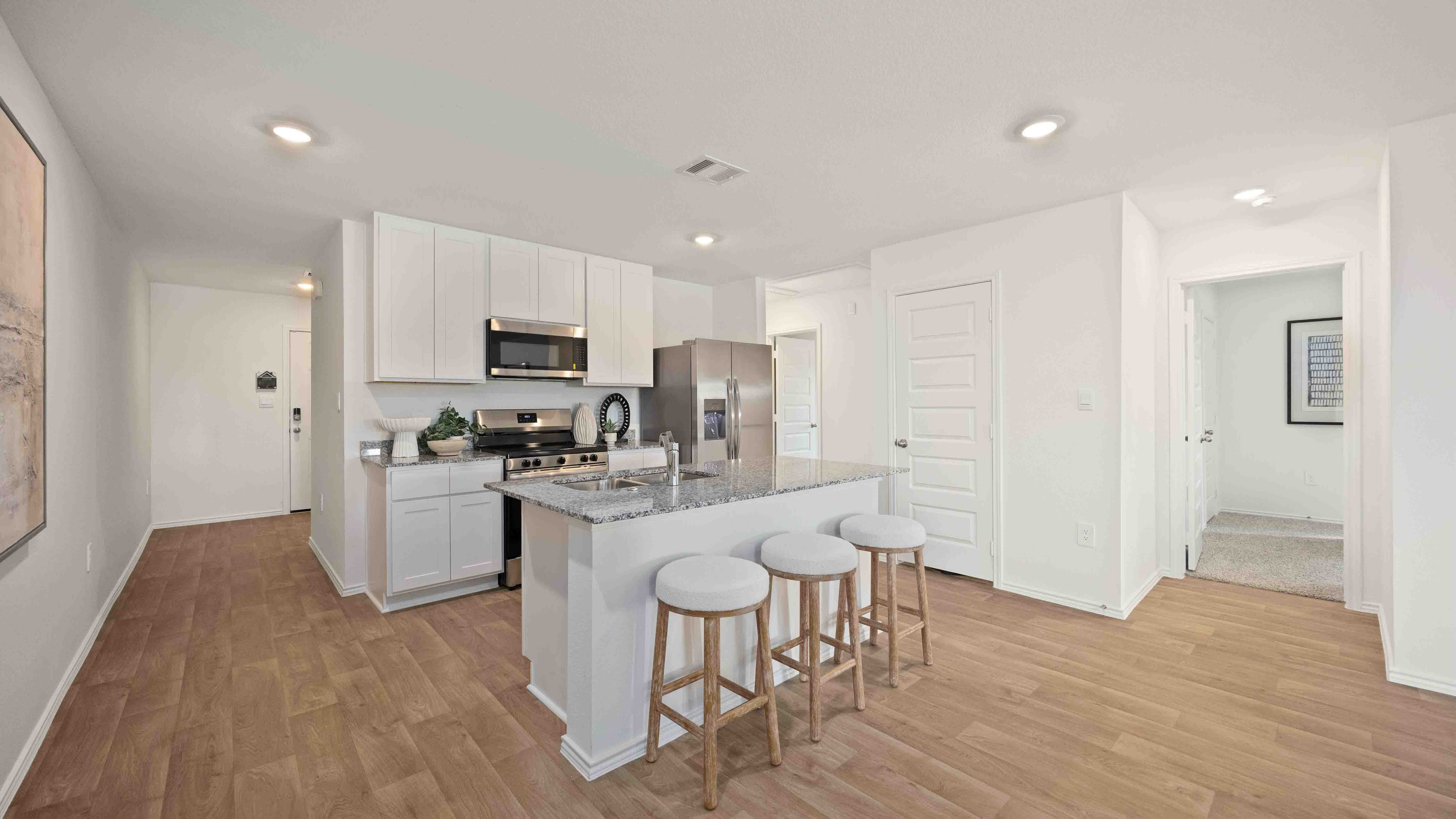kitchen island - a spacious island offers bar seating perfect for dining or entertaining