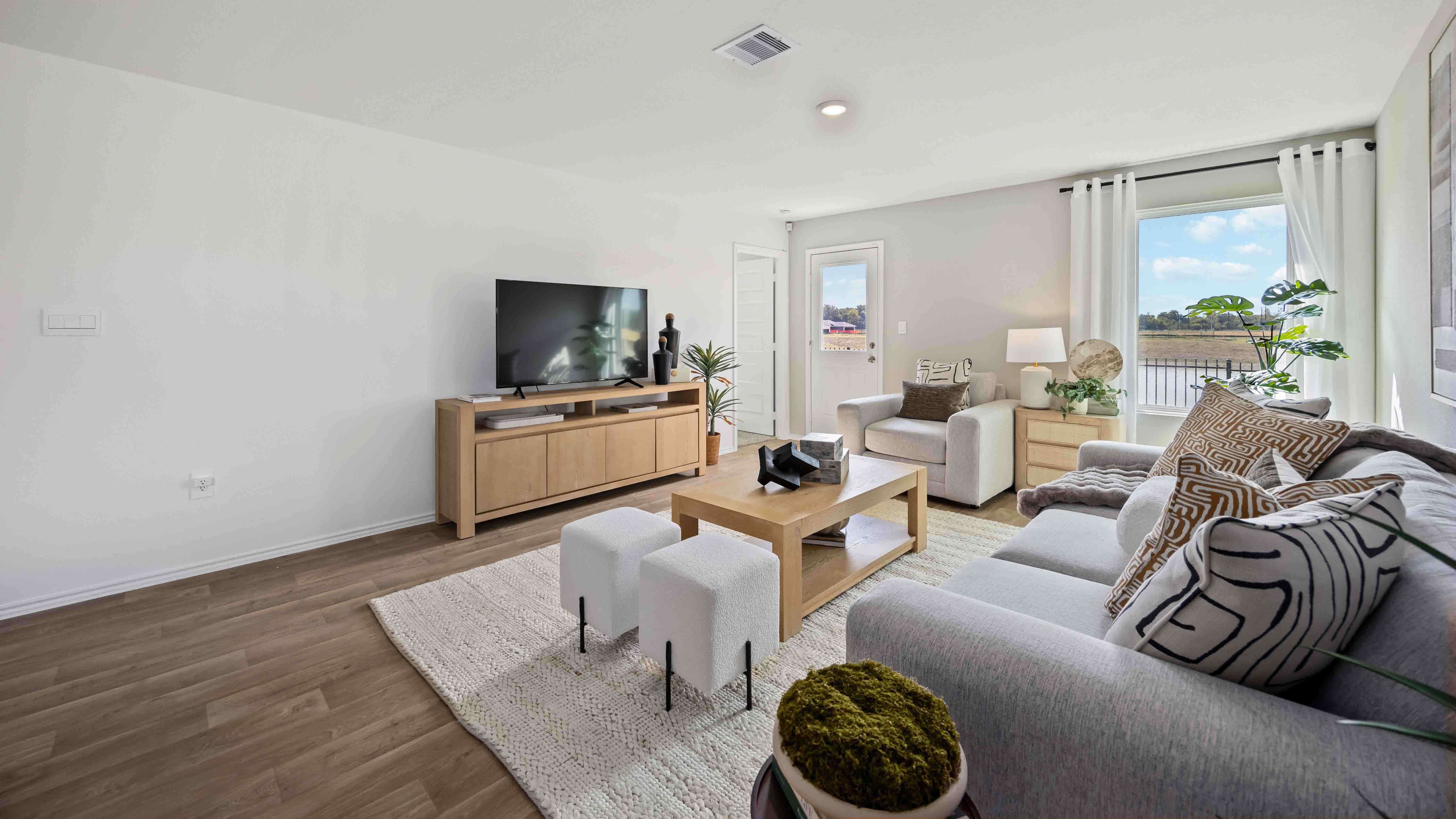 living room area with room for a couch and 2 additional chairs