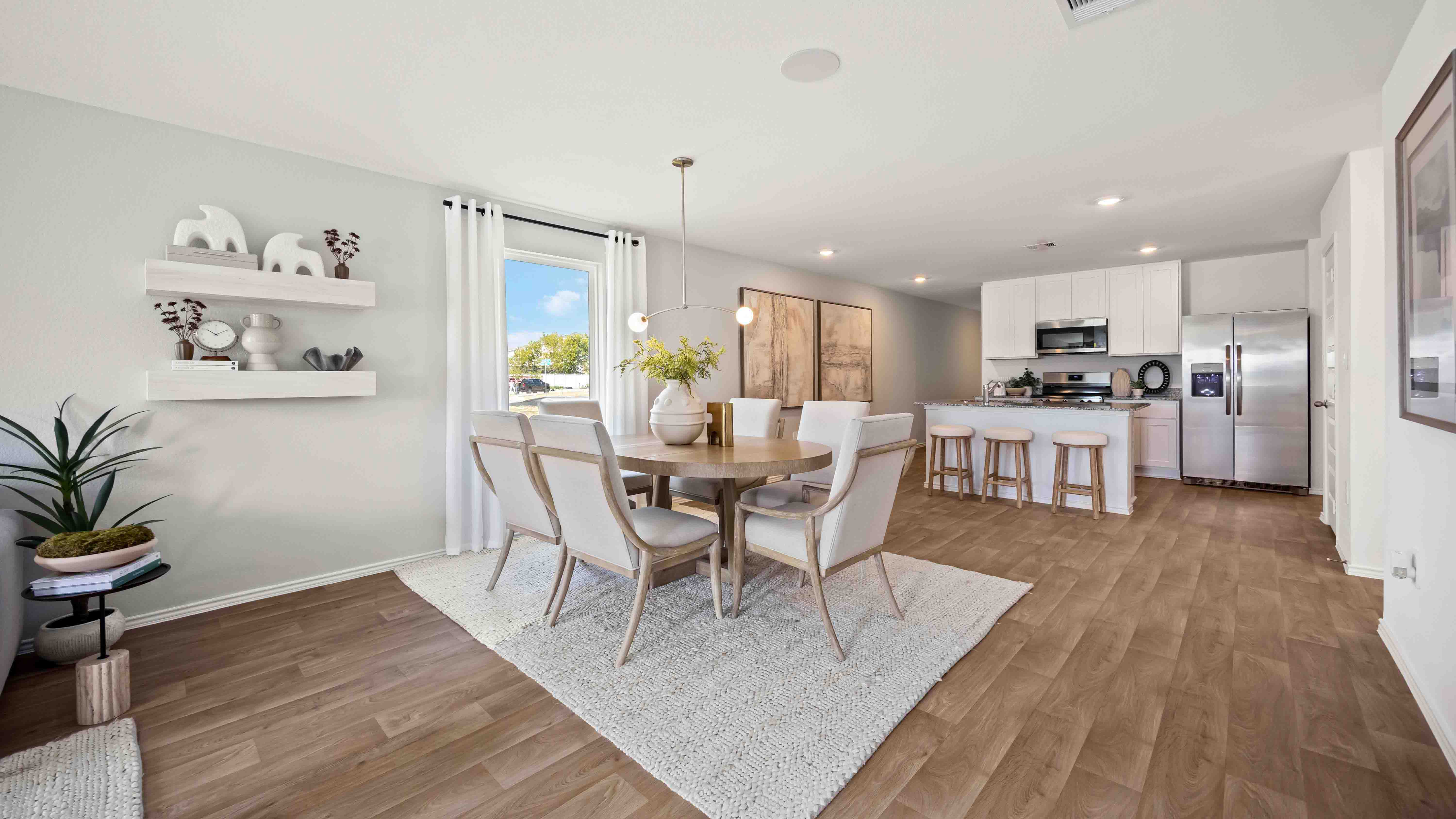 open concept dining and kitchen area, great for entertaining guests