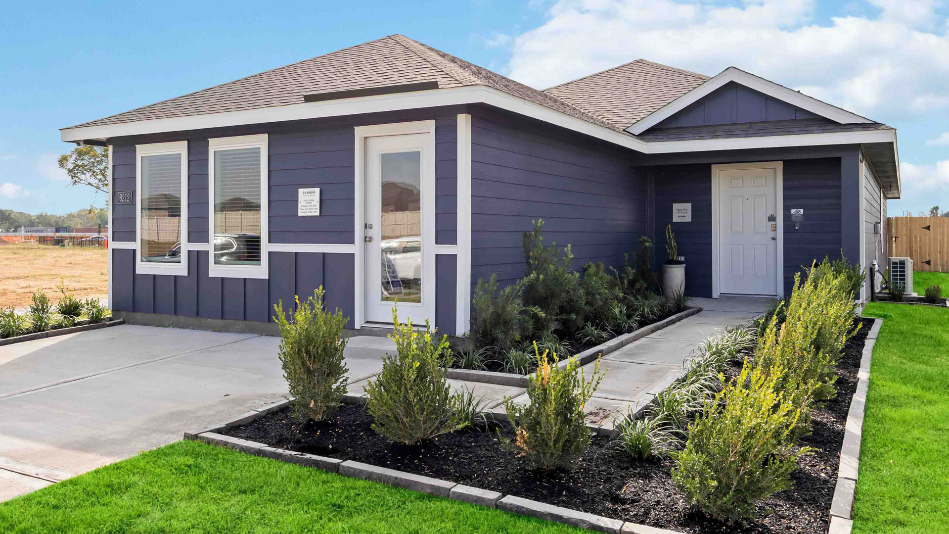 one story home with a two car garage