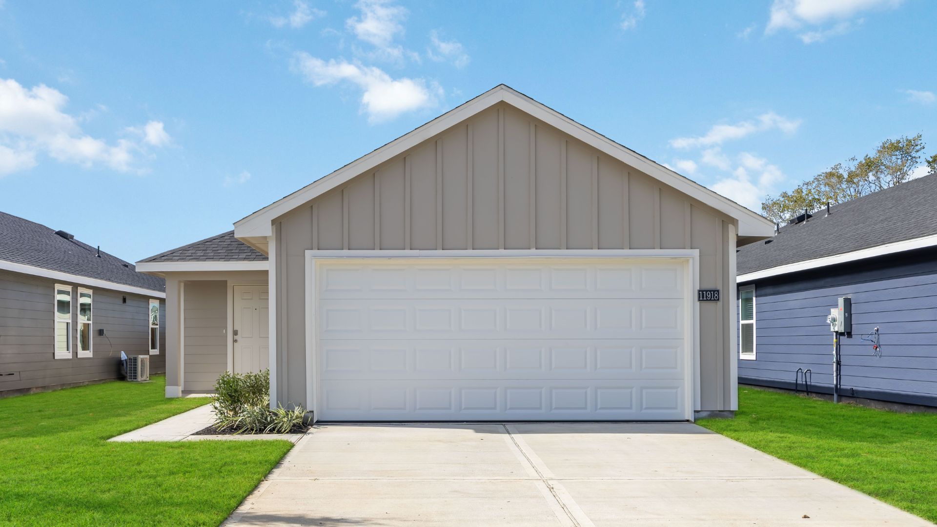 One-story home with siding and a two-car garage