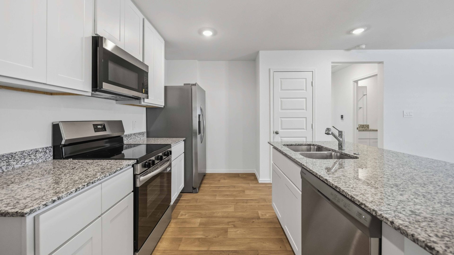 kitchen island - a spacious island offers bar seating perfect for dining or entertaining