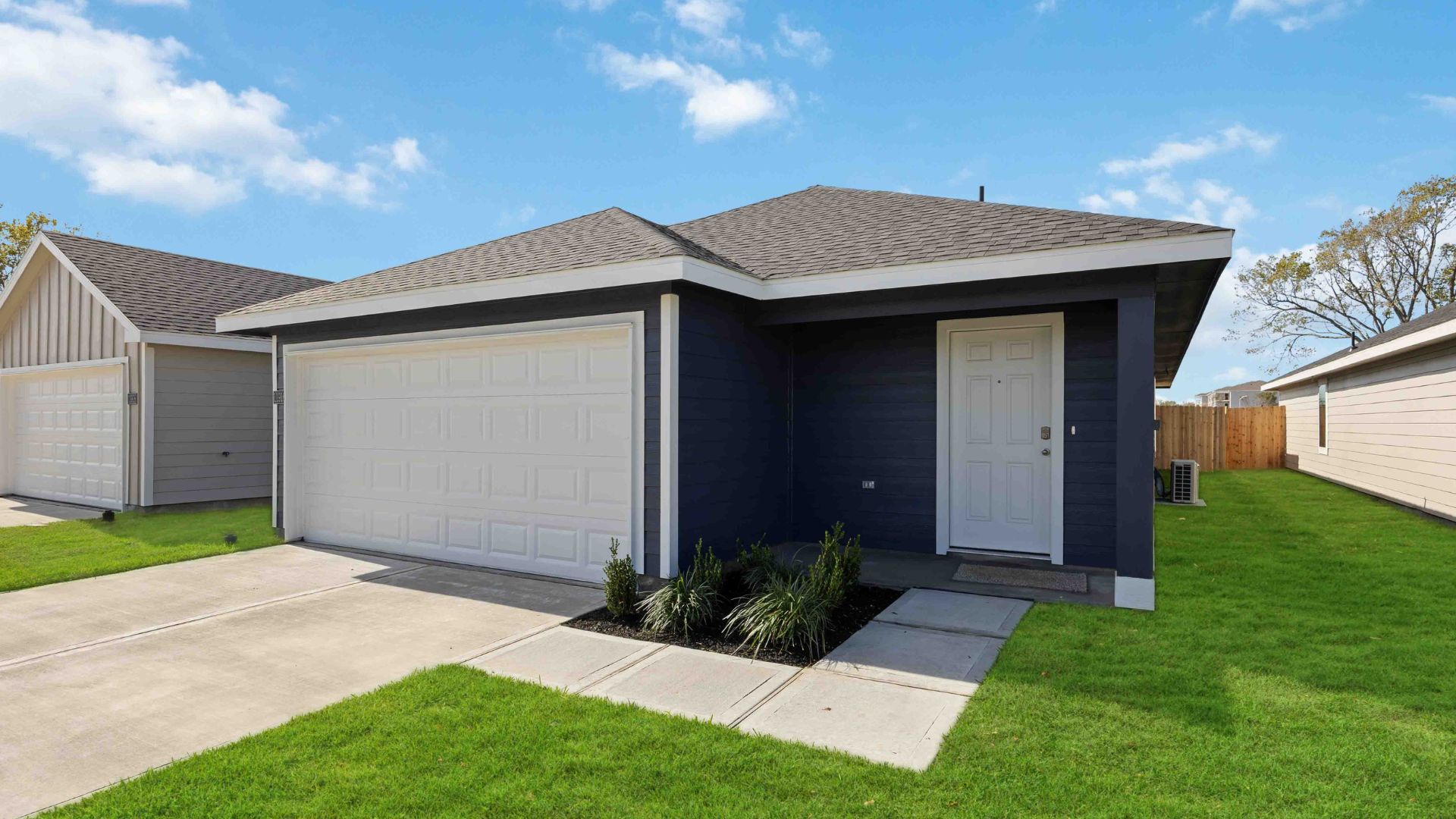 One-story home with siding and a two-car garage
