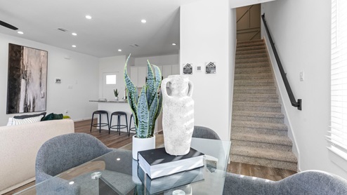 Staircase off dining area leading to upstairs