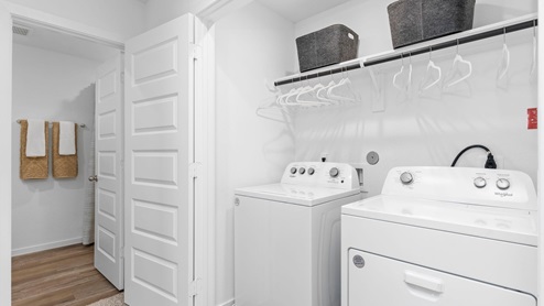 Laundry room area in upstairs hallway