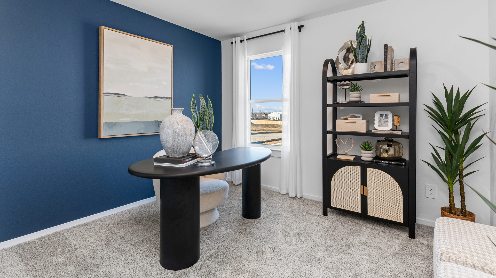 a third bedroom can be used as a home office and has ample light from a large single window