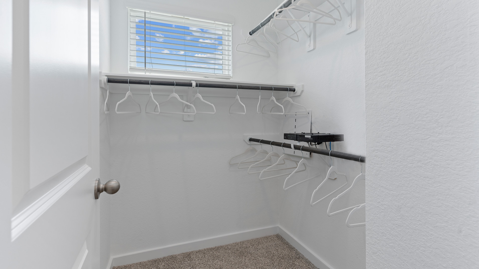 a spacious closet is located off the primary bathroom for convenience