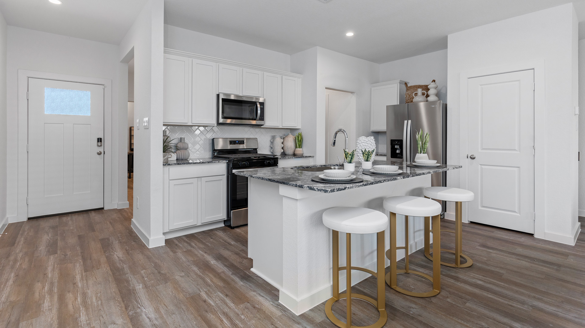 beautiful kitchen with bar seating at the island