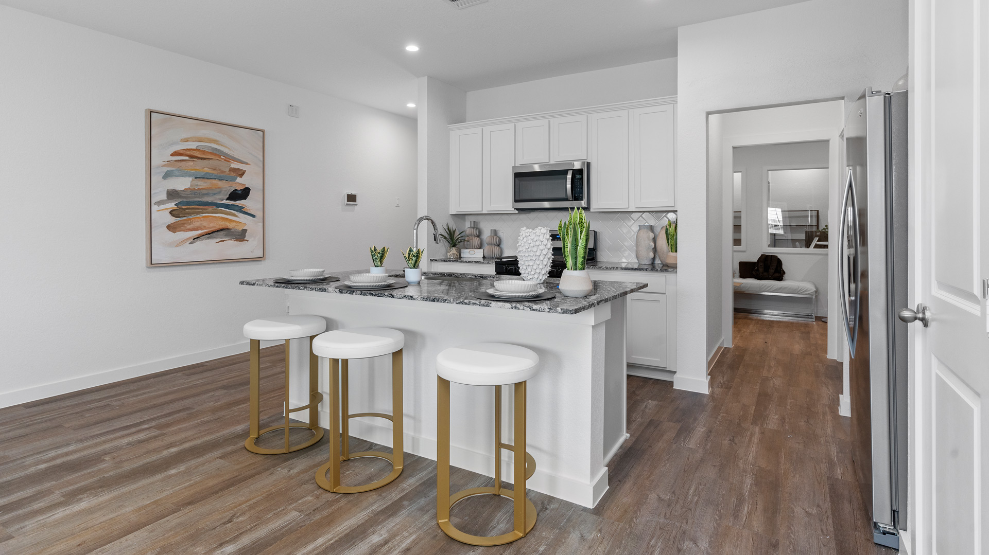 boxwood plan kitchen with light cabinets and granite counters