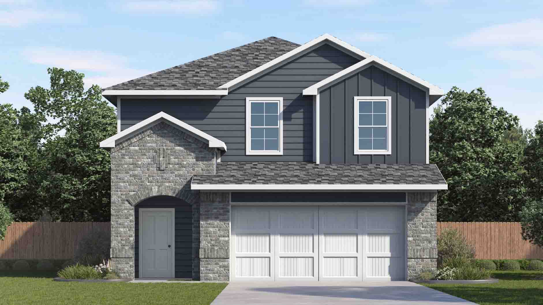 two story home with dark grey siding and brick with a two car garage