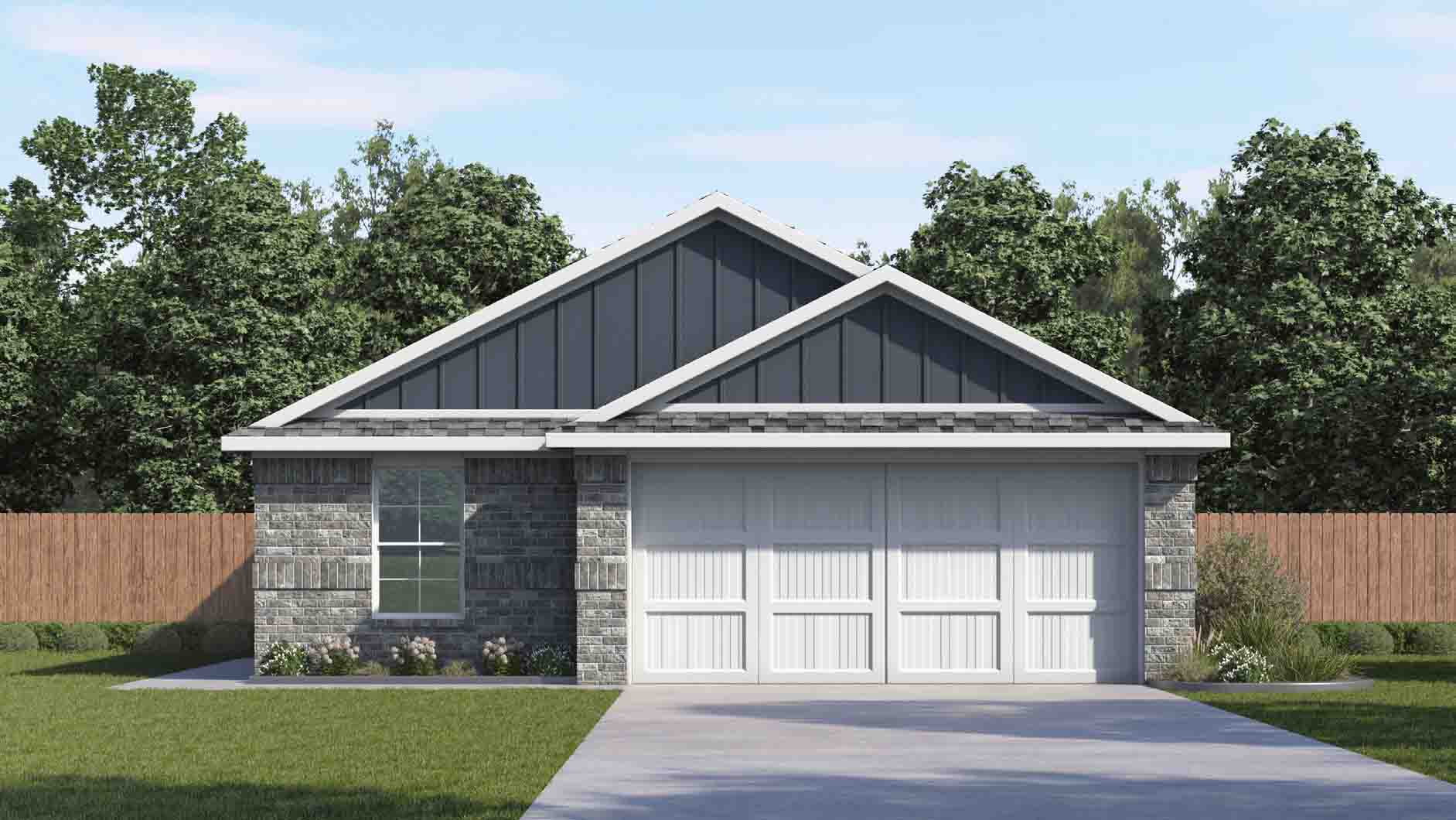 one story home with siding and brick with a two car garage