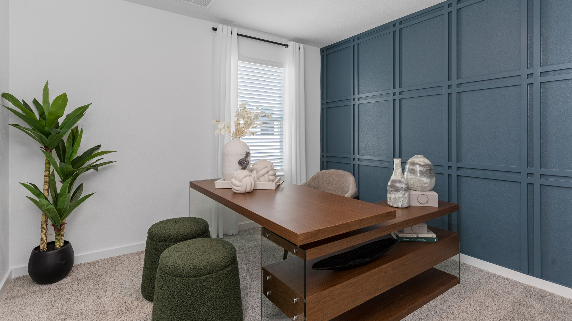home office/third bedroom has light neutral walls and carpet flooring