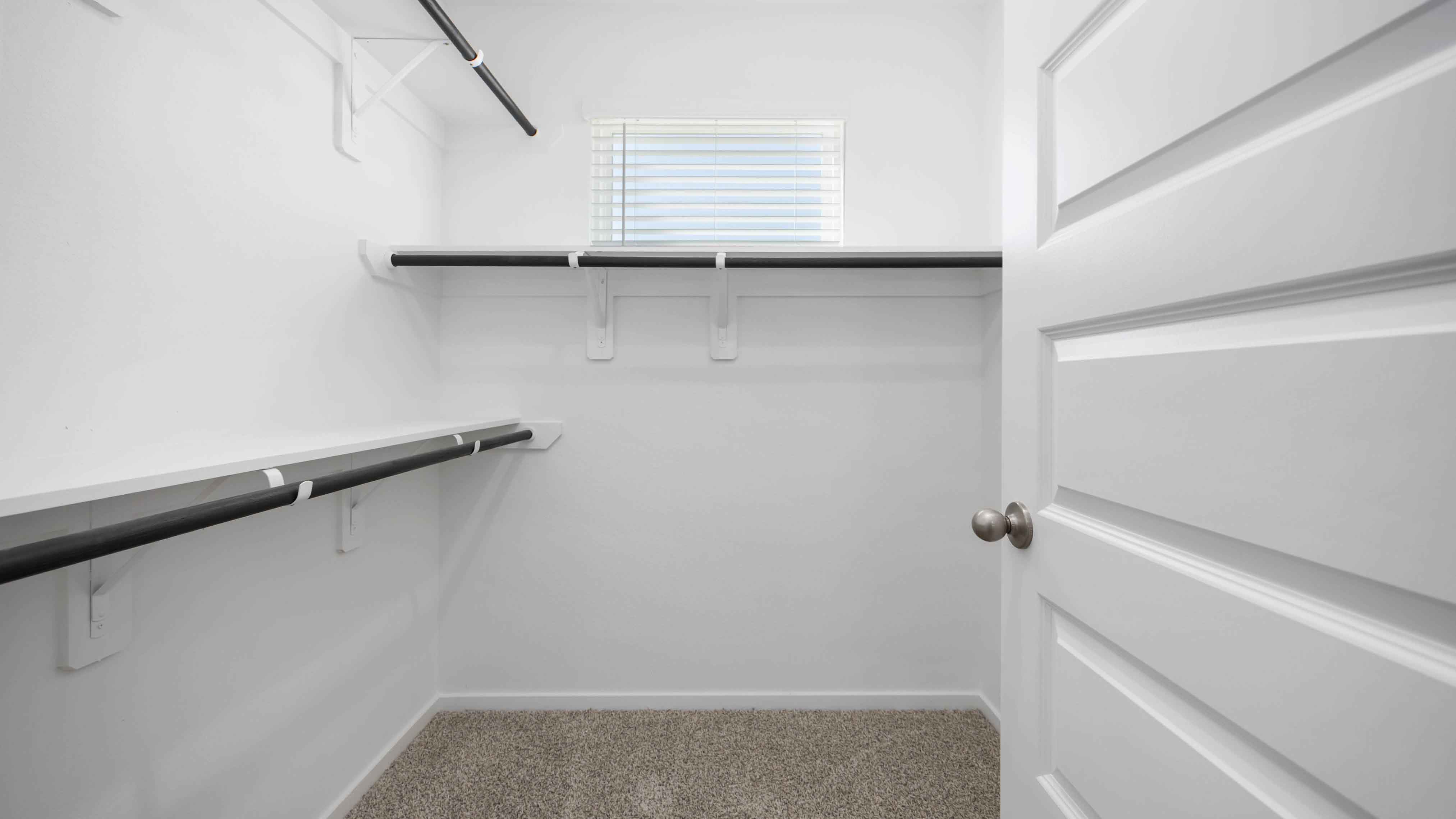 walk-in closet in the primary with lots of storage