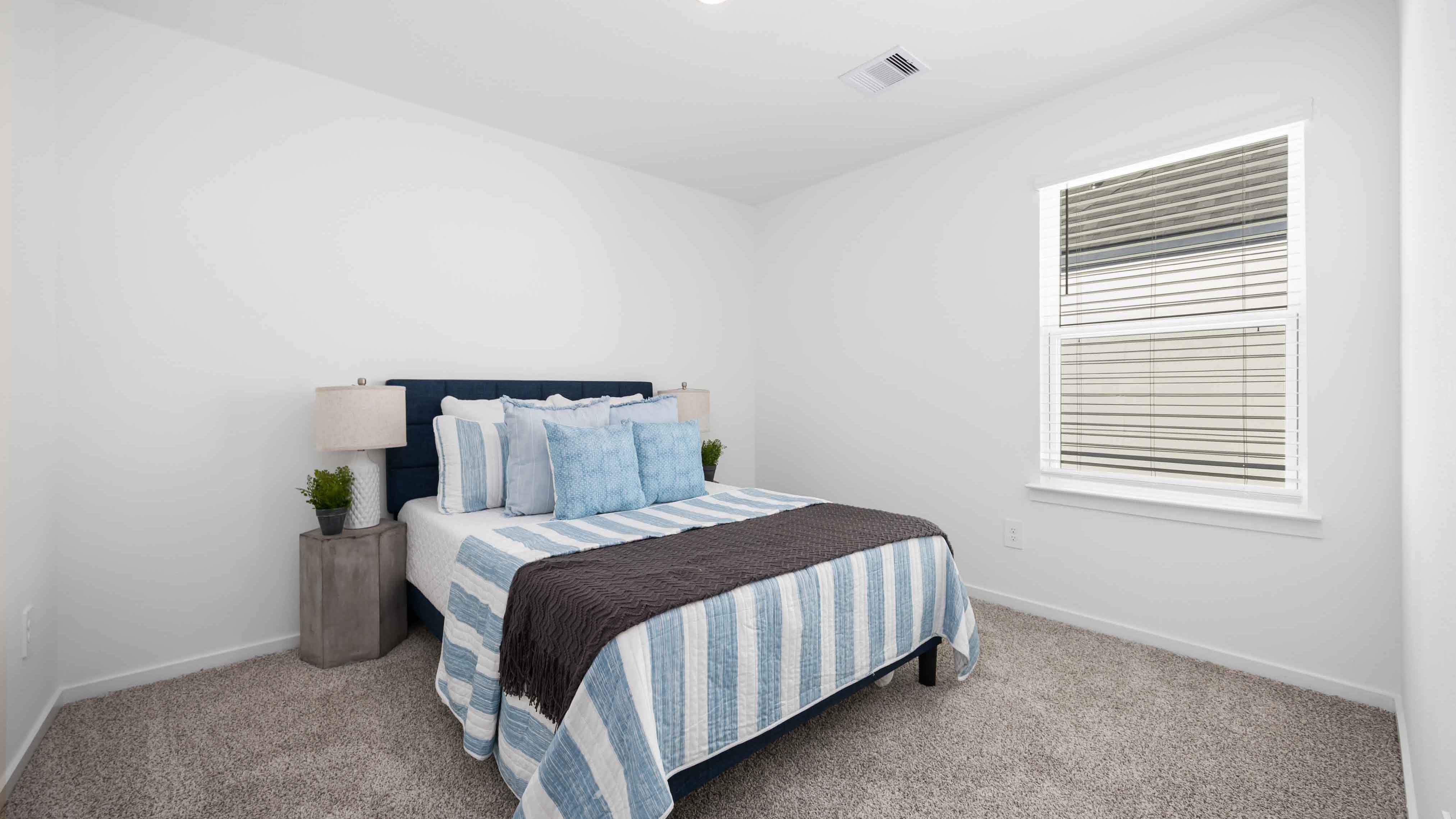 a second bedroom upstairs has a window for natural light