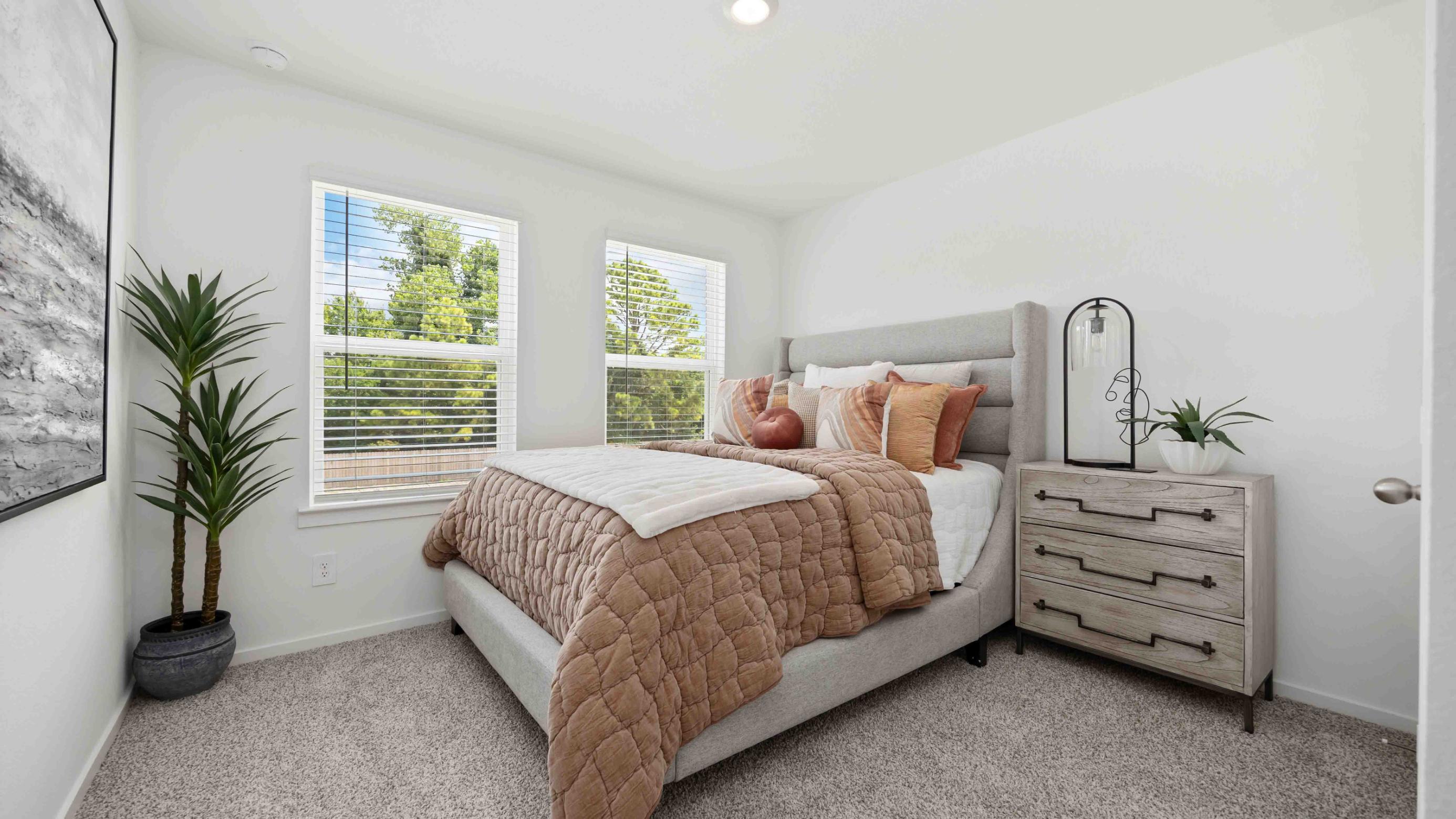 a second bedroom upstairs has a window for natural light