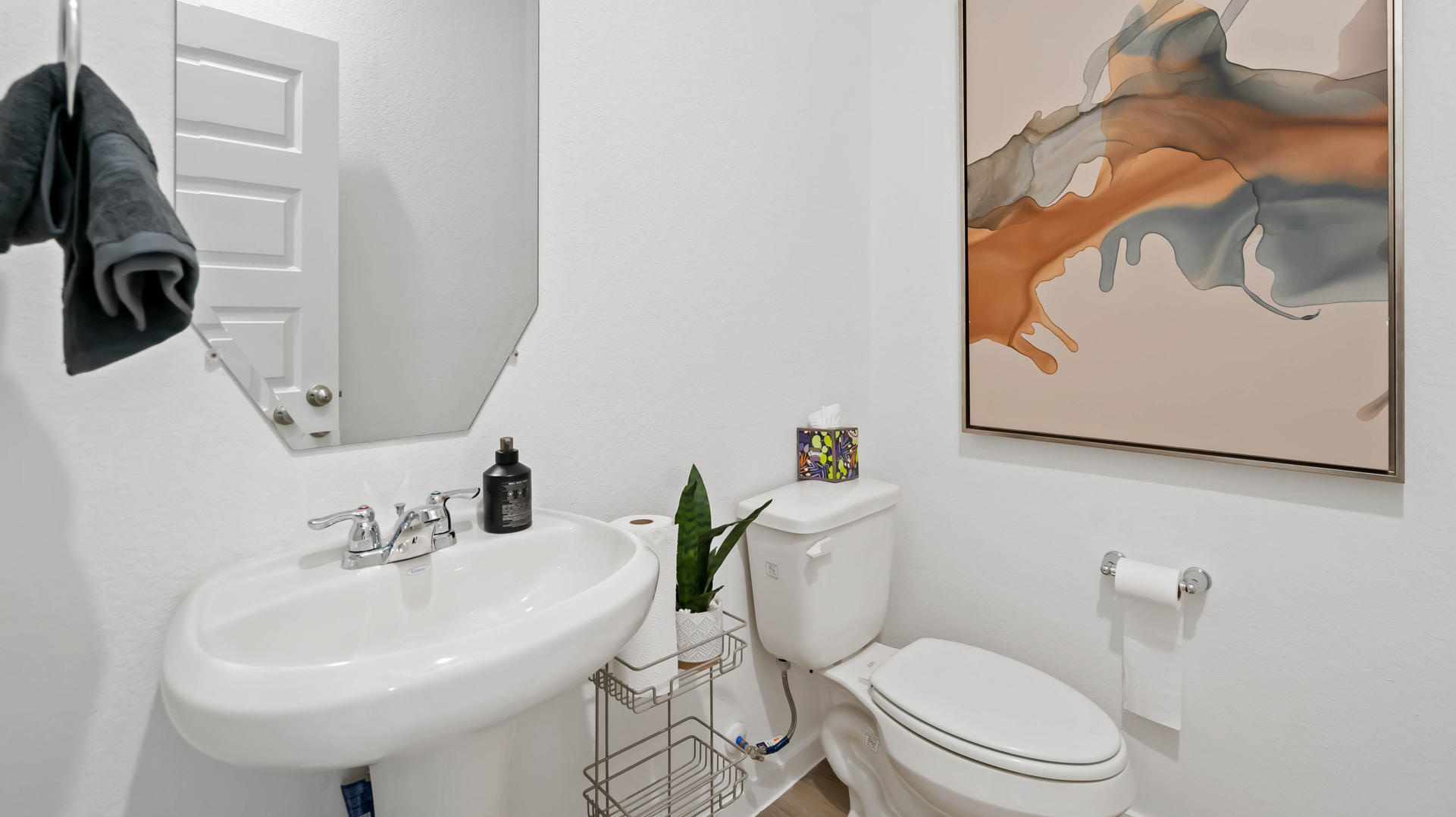 powder bathroom located downstairs for convenience