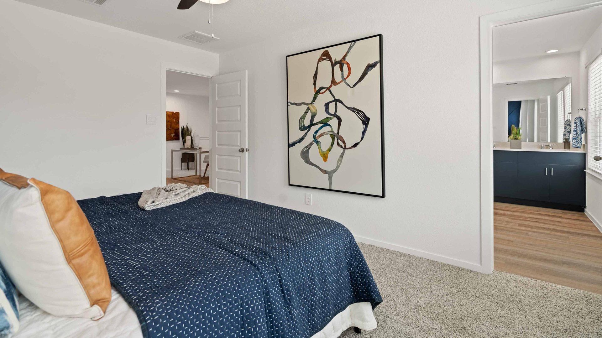 primary bedroom comfortably fits a king size bed