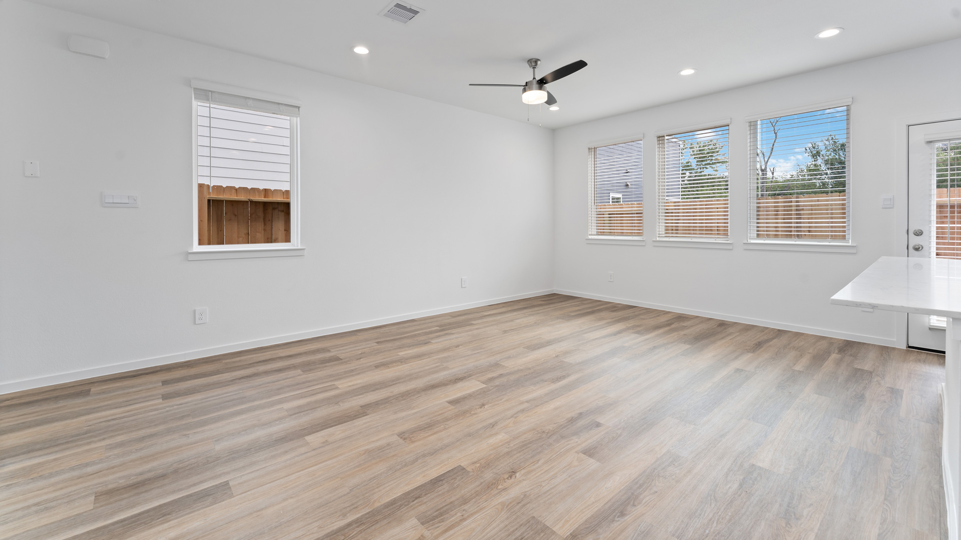 natural light floods into the home from the abundance of windows