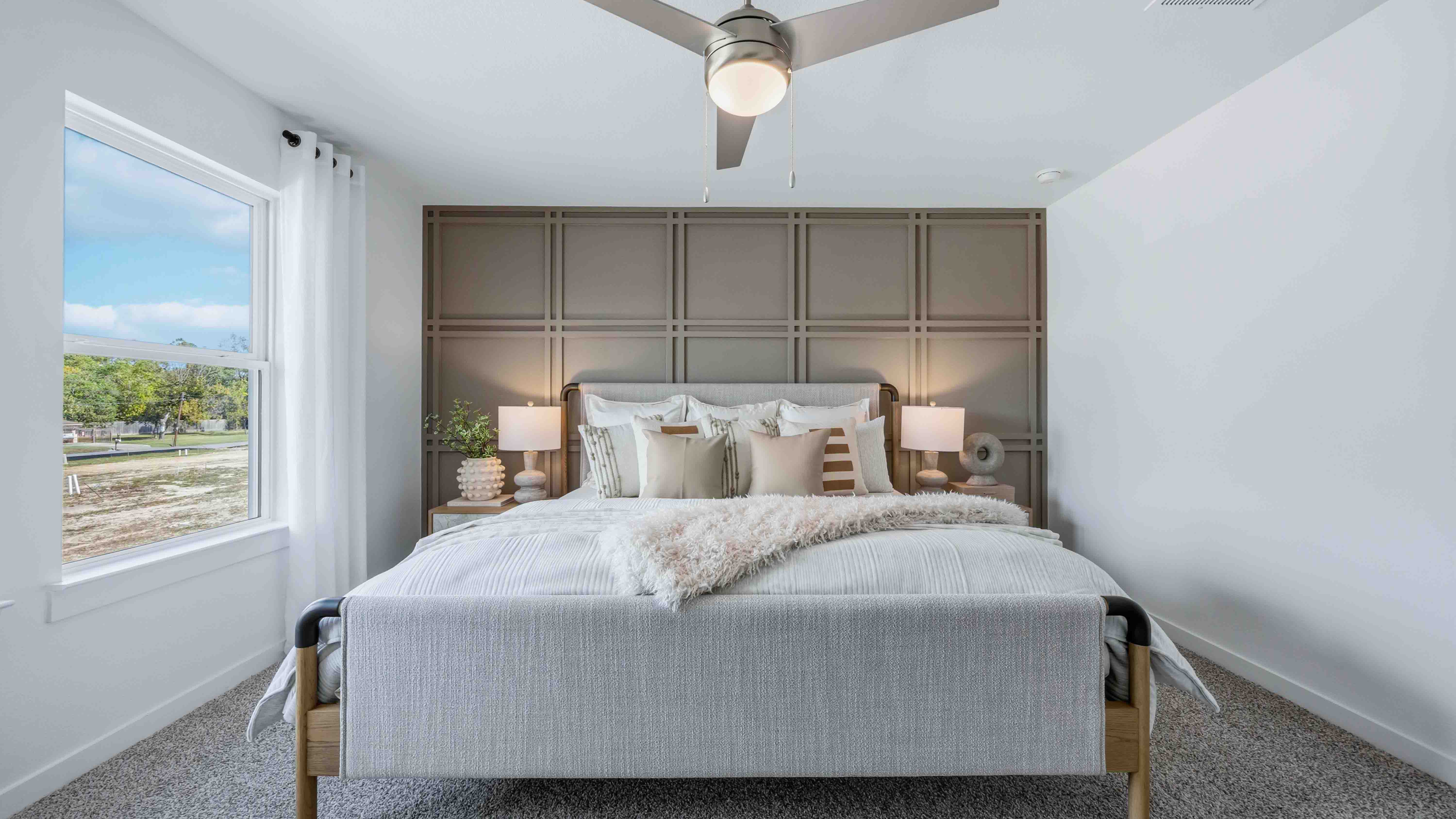 primary bedroom with room for a king bed and side tables