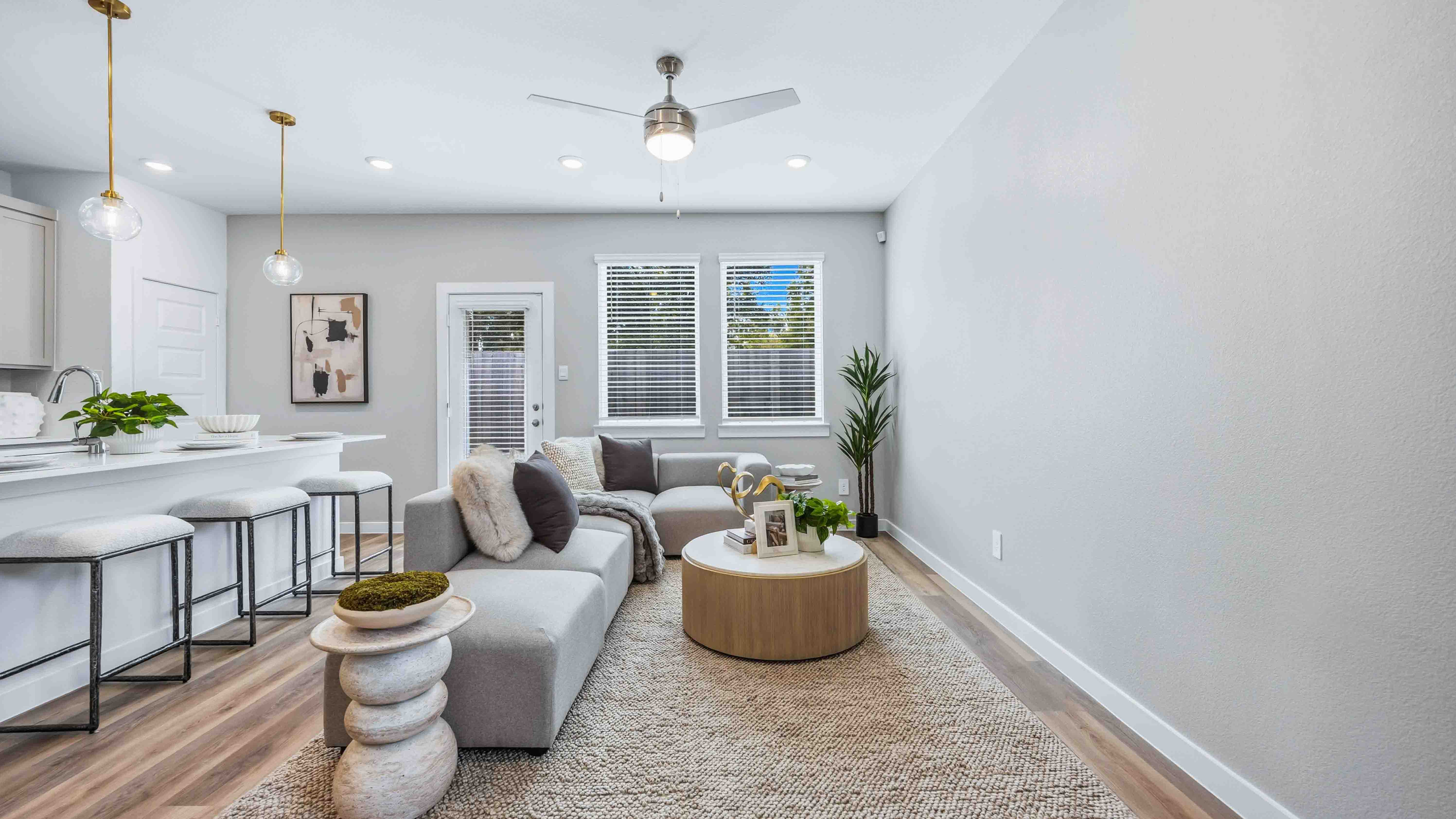 living room area with room for a sectional couch and coffee table