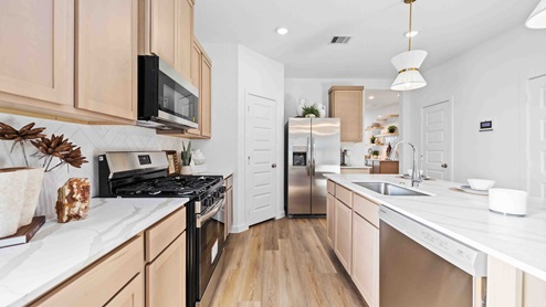 kitchen with a beautiful quartz accented countertop