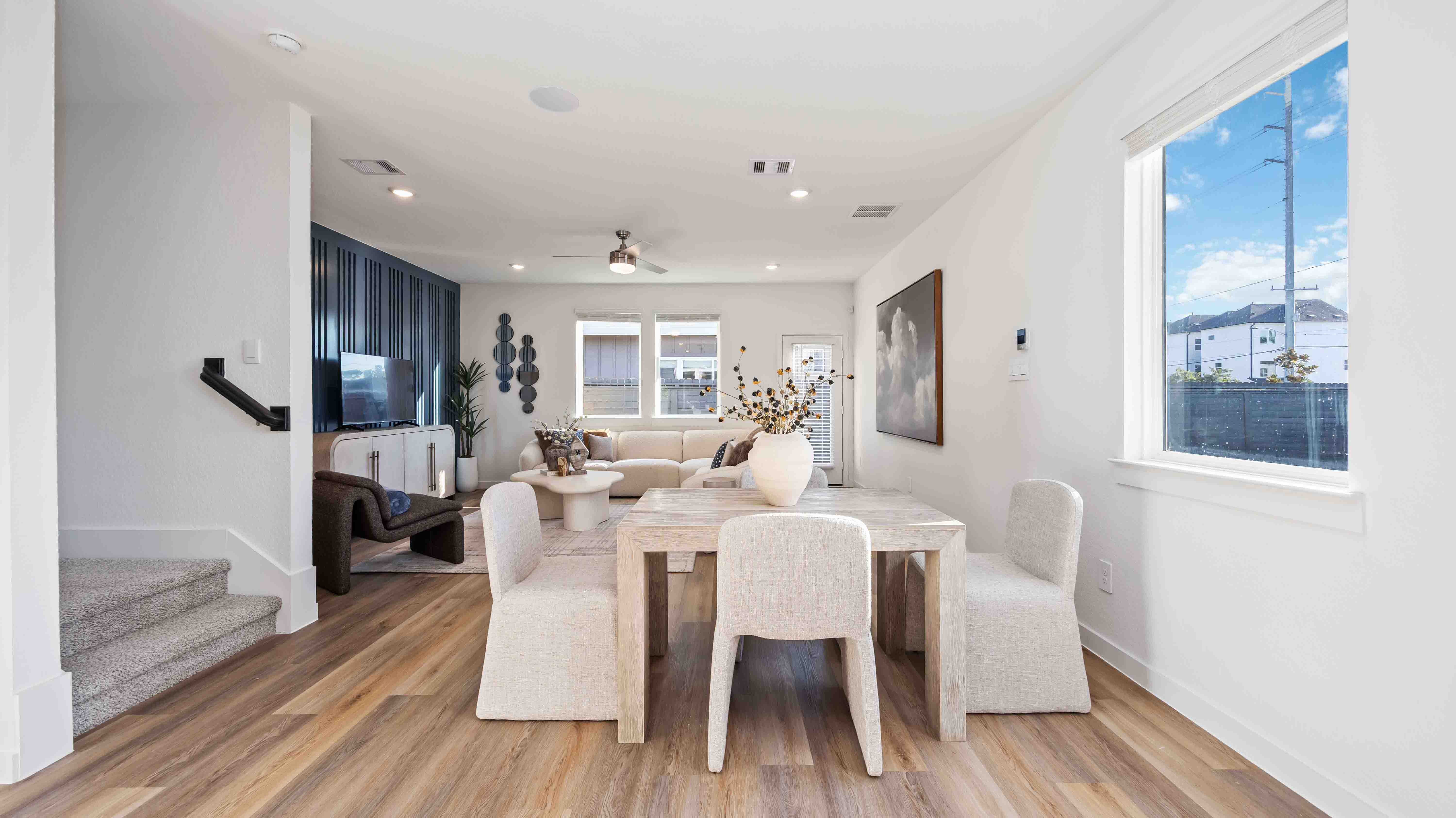 dining area in between the kitchen and living room