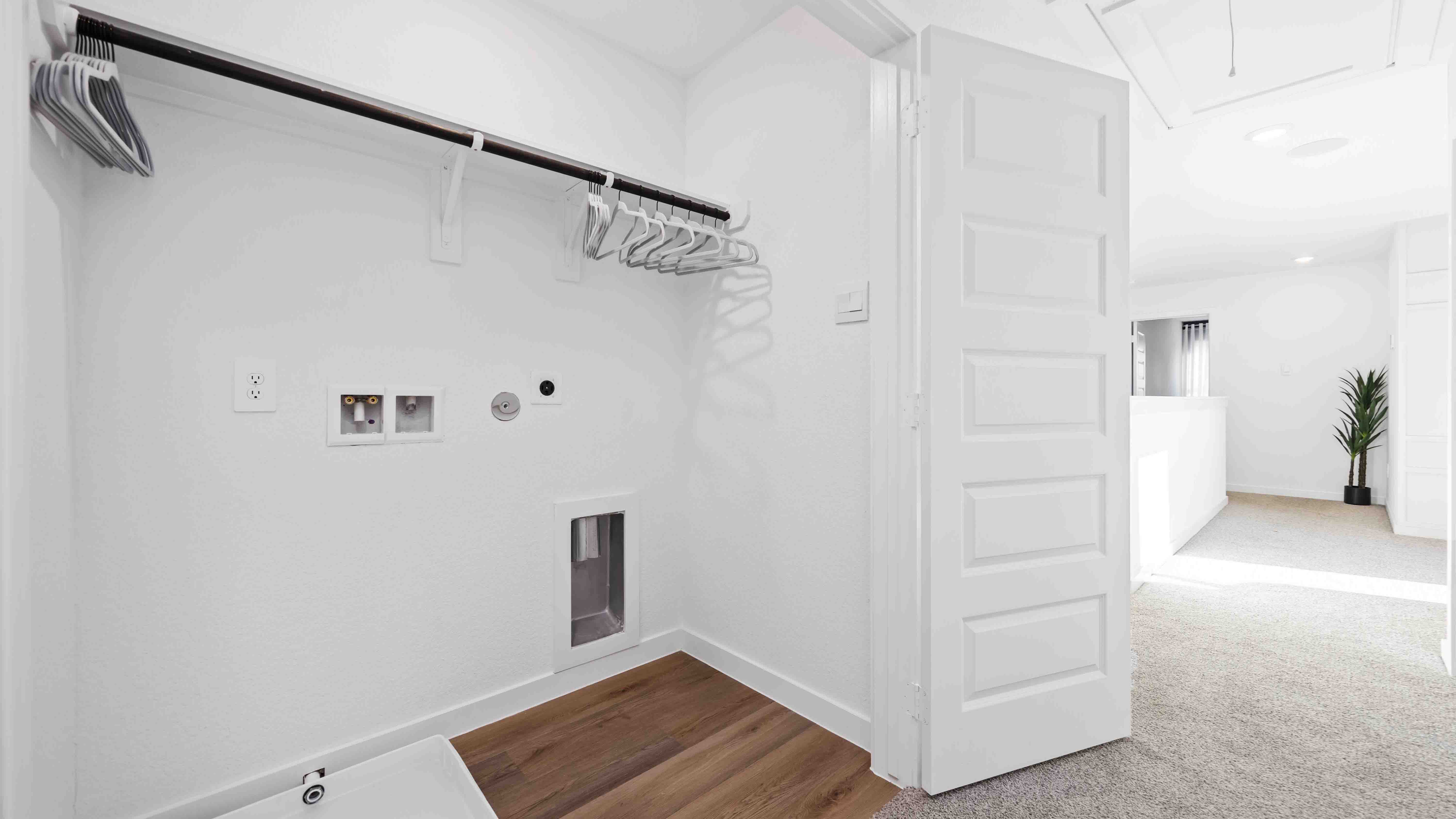 laundry room area off the upstairs hallway