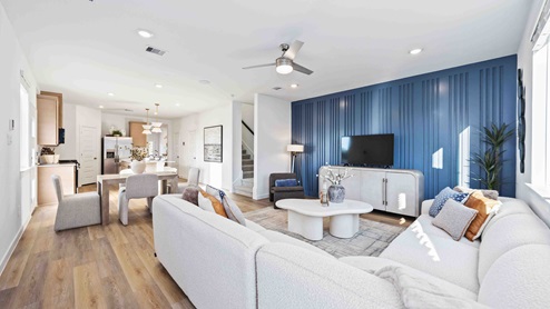 living room that overlooks the dining and kitchen area