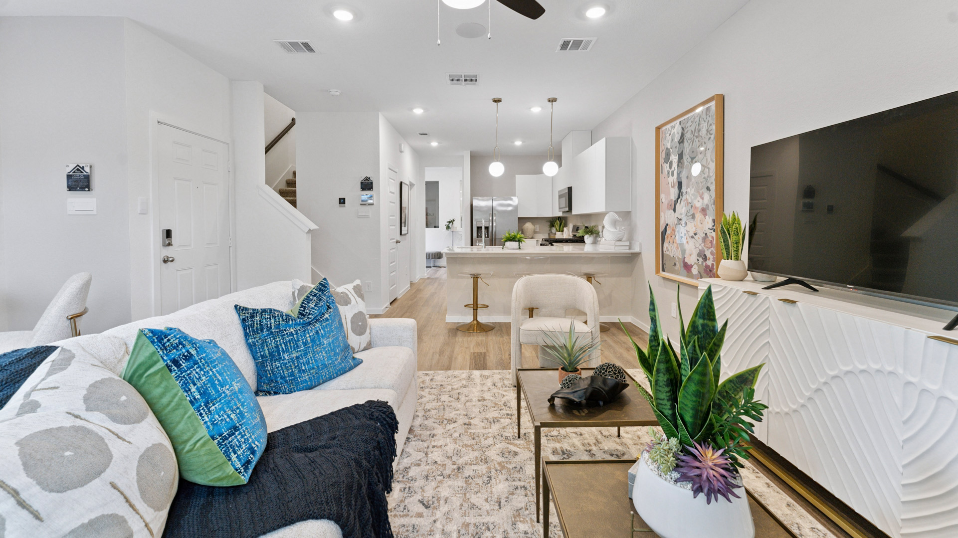 living room opens to all main living areas of the home