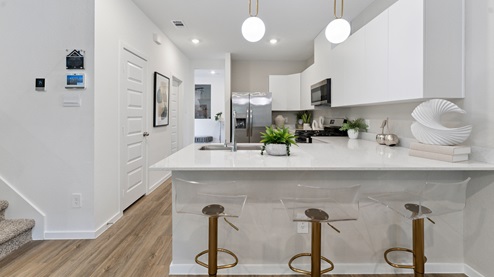 bar seating at the kitchen counter created the perfect space for dining or entertaining