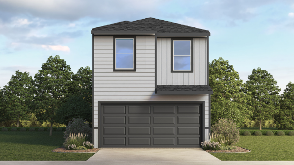 two-story home with white siding and a two-car garage.