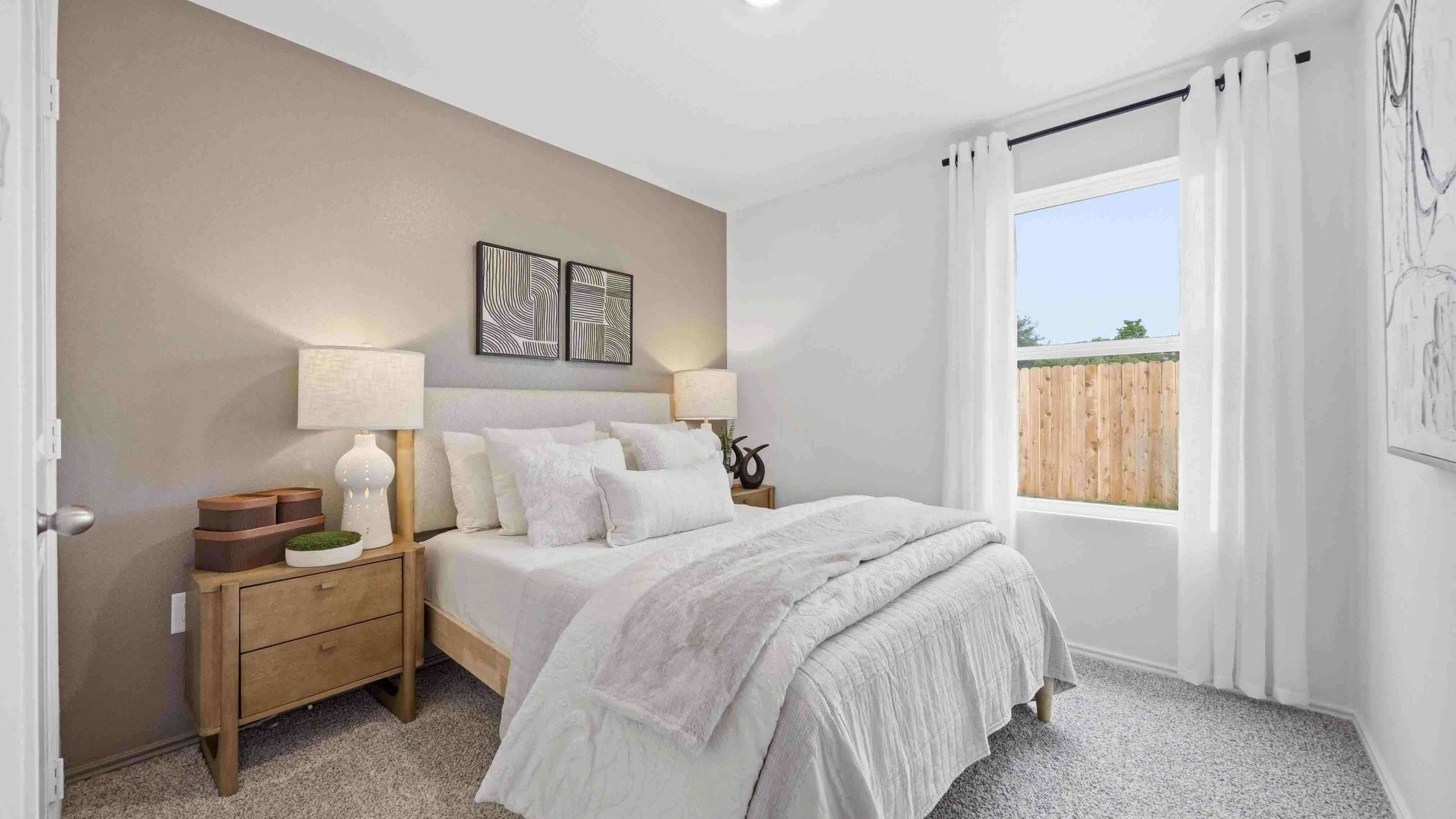 secondary bedroom with neutral walls