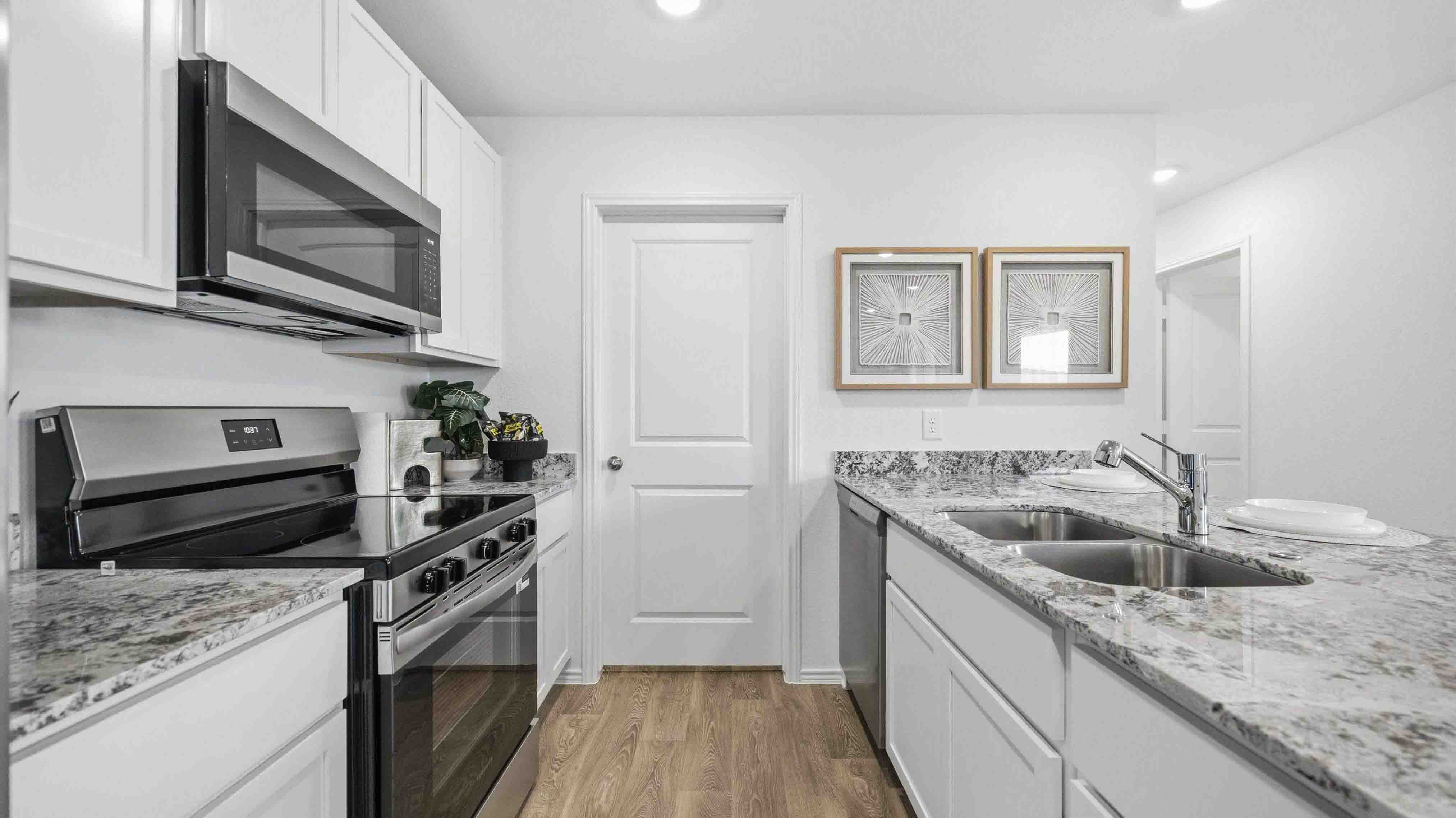 kitchen with stainless steel appliances and a walk in pantry