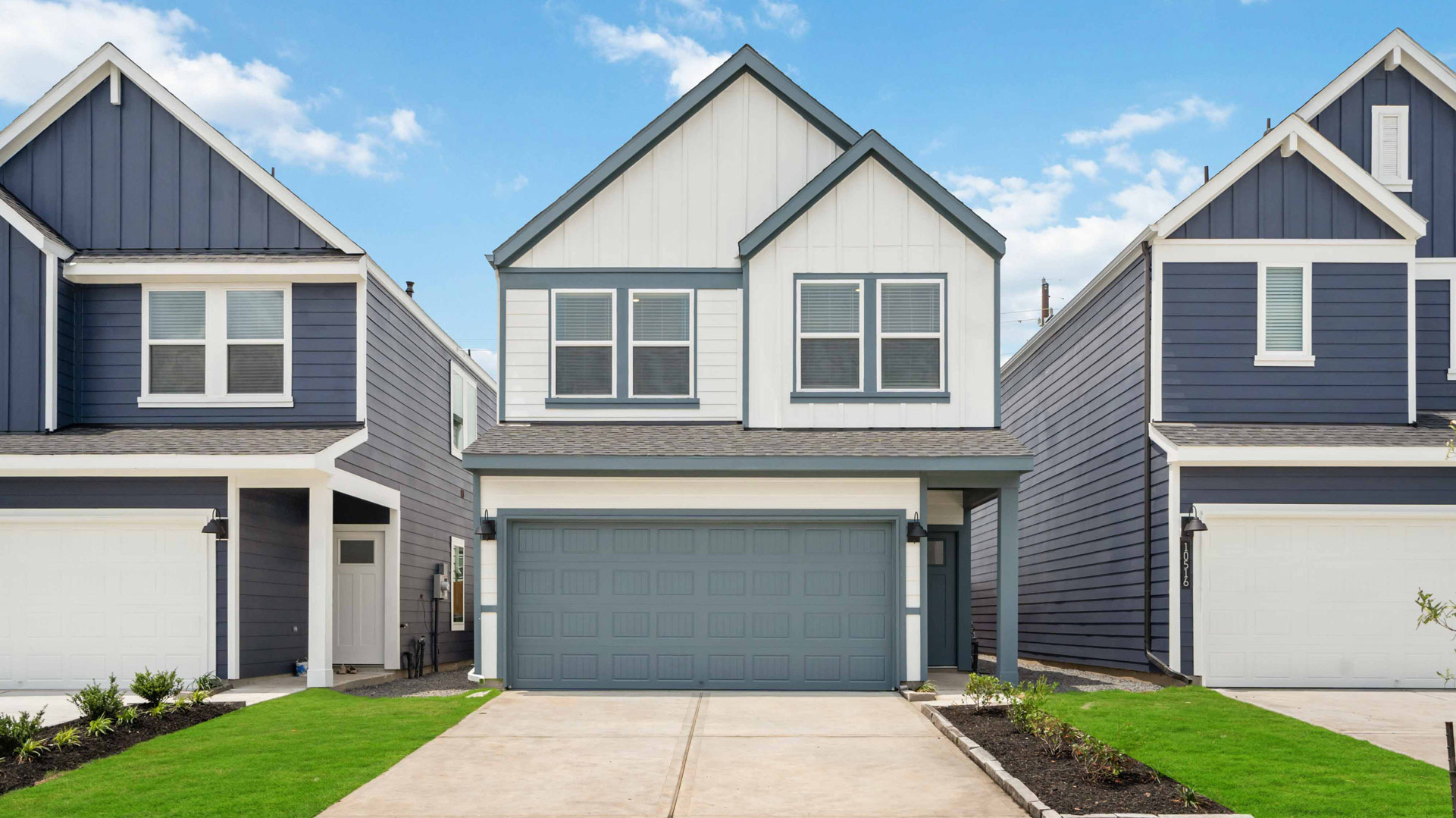 hibiscus floor plan with large windows for natural lighting and a two car garage
