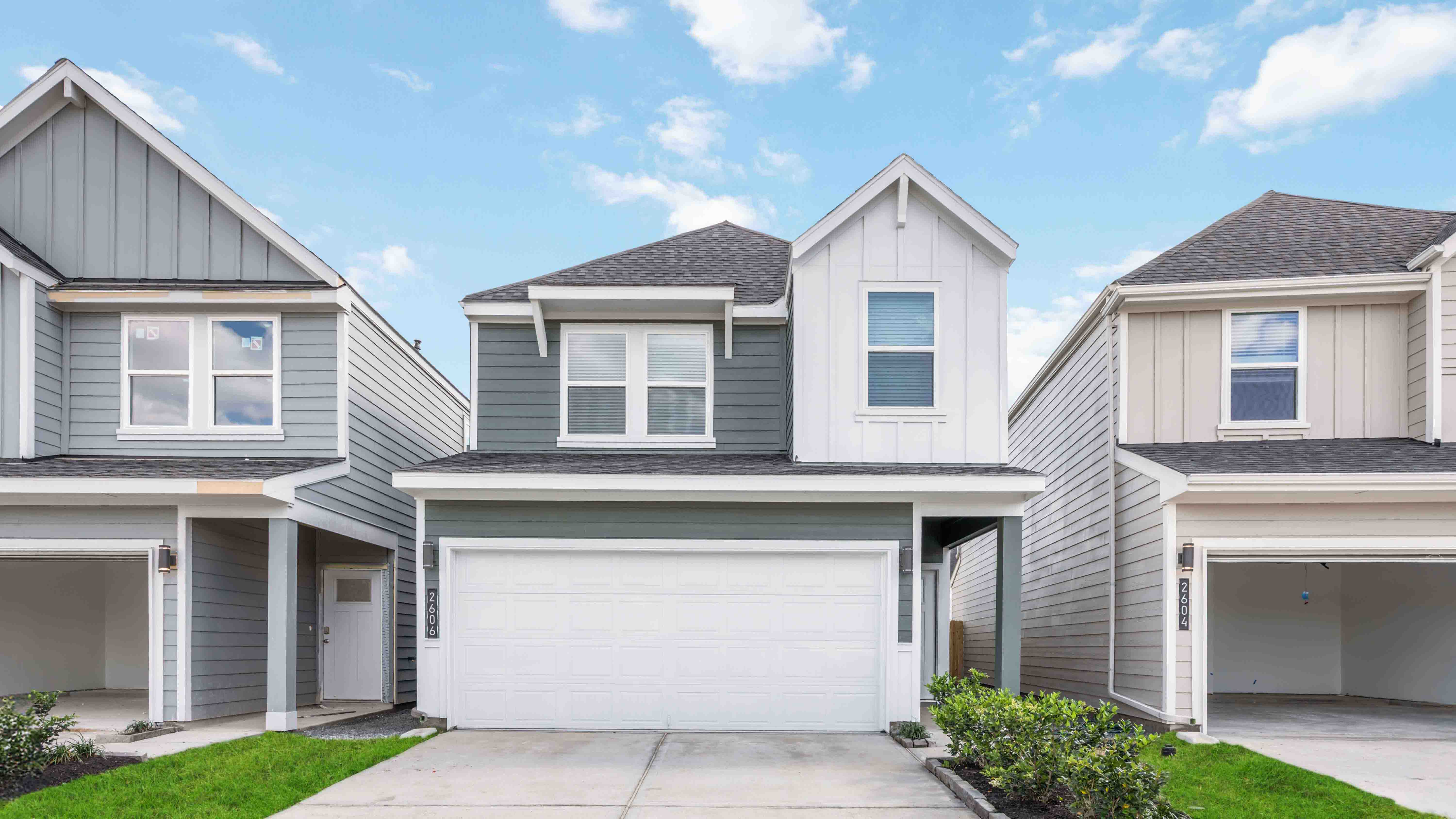 gardenia floor plan with two tone exterior and a two car garage